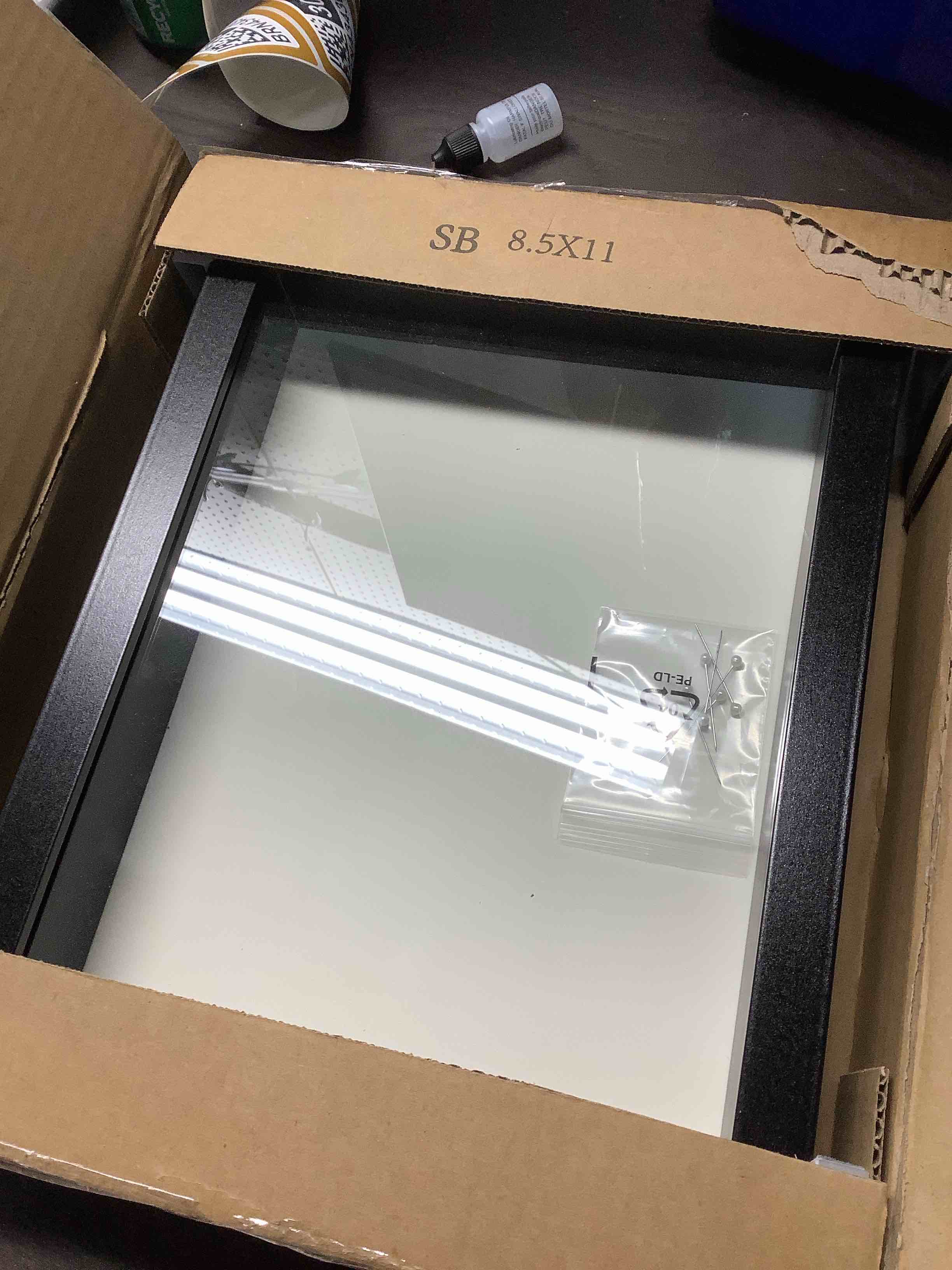 Condition photo showing New/Like New for Americanflat 8.5x11 Shadow Box Frame with Shatter-Resistant Glass - Silhouette Collection - Large Shadow Box Display Case for Tabletop and Wall Display - Black with Soft Felt Back