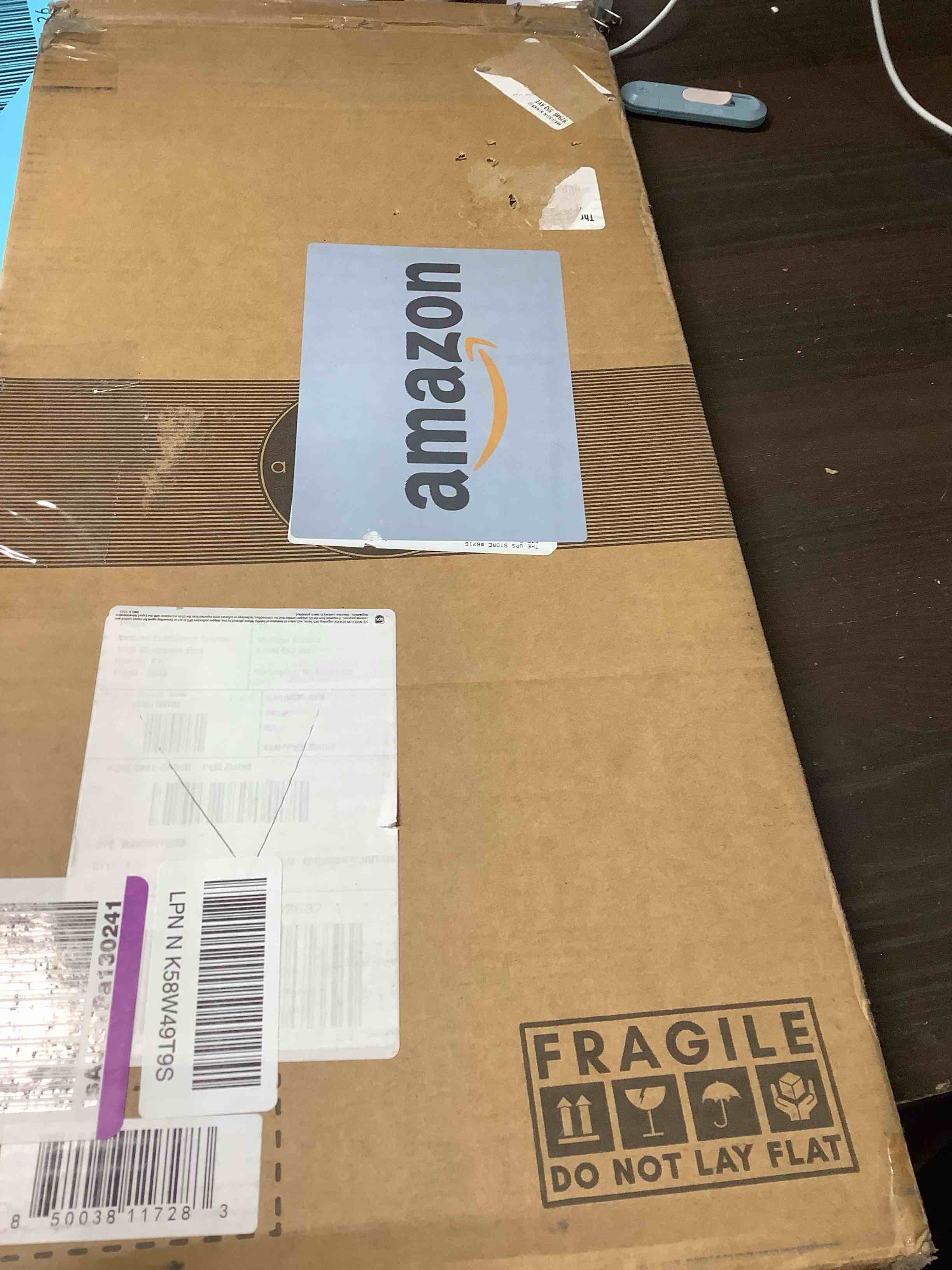 Condition photo showing New/Like New for Americanflat 4x6 Collage Picture Frame with Shatter-Resistant Glass - Fits Four 4x6 Photos or Use as One 8x20 Picture Frame - Signature Collection - Collage Frames for Wall Display- Walnut