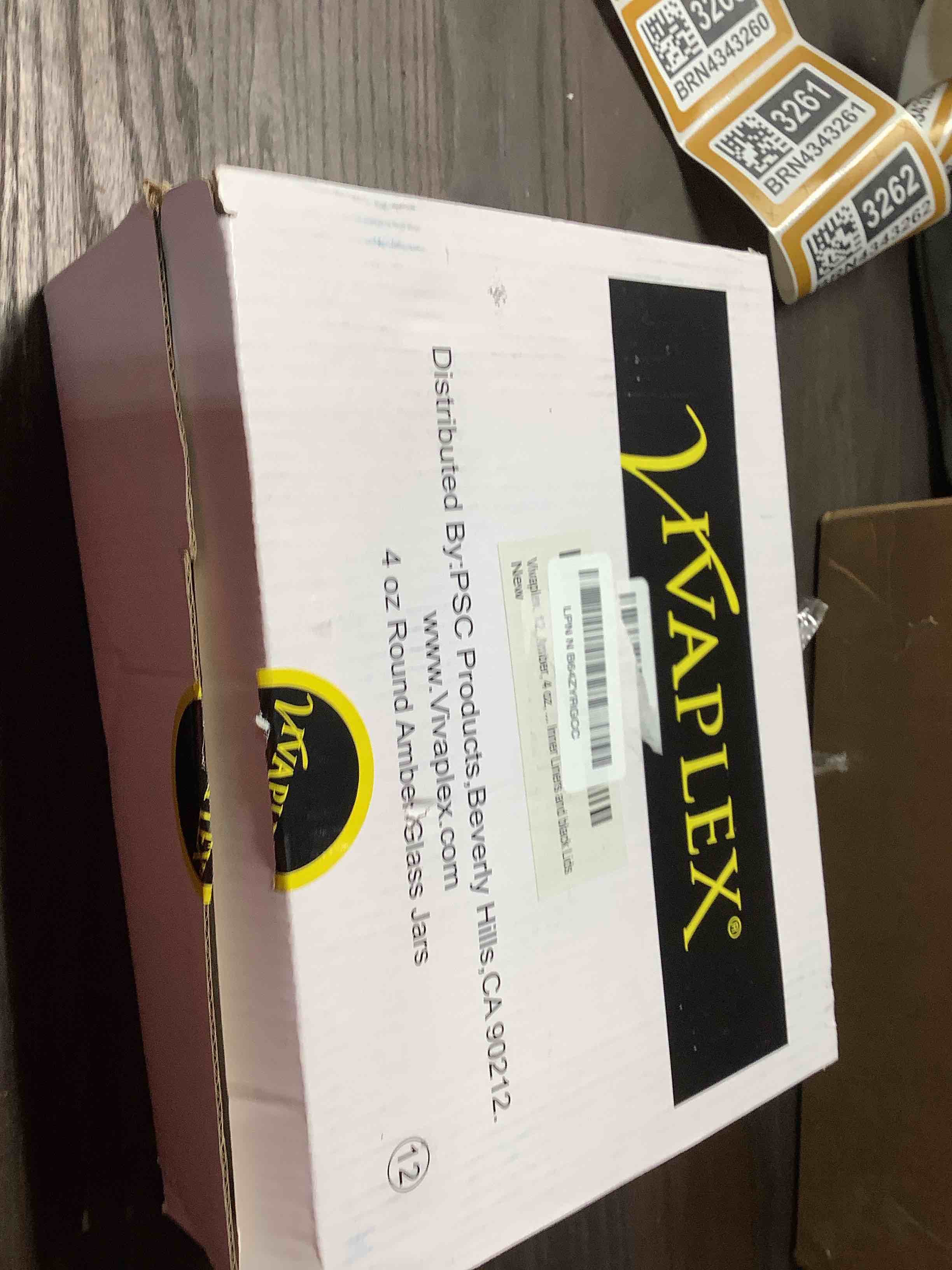 Condition photo showing New/Like New for Vivaplex, 12, Amber, 4 oz, Round Glass Jars, with Inner Liners and black Lids 4 Ounces