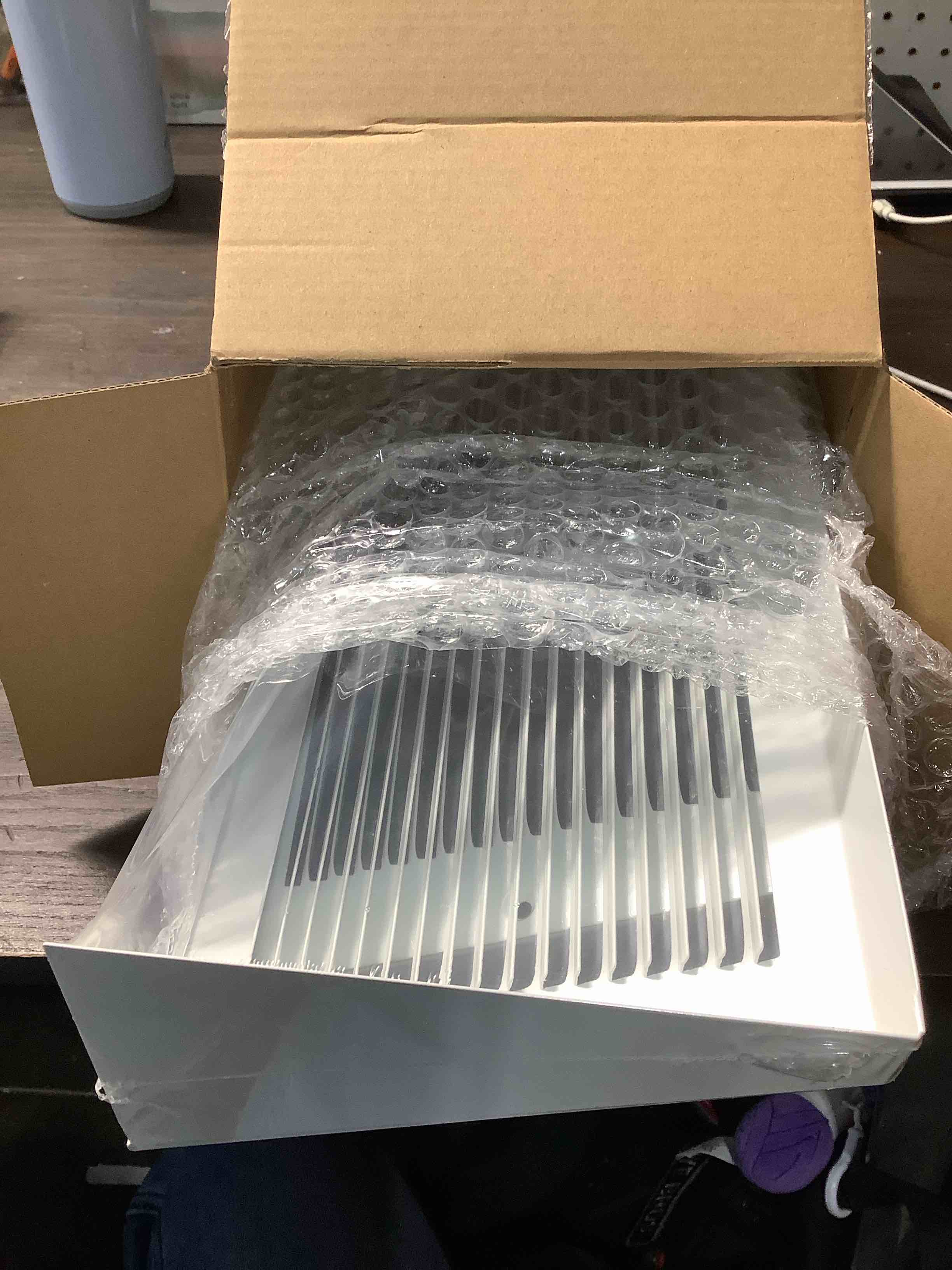 Condition photo showing Good Condition for Honeydak 2 Pack Baseboard Register Vent Covers 12 x 6 Duct Opening Size Baseboard Return Air Grille Diffuser, Steel Triangular Air Return Vent Cover, Outer Dimensions: 13-3/4 x 6-5/8 2 12"w X 6"h