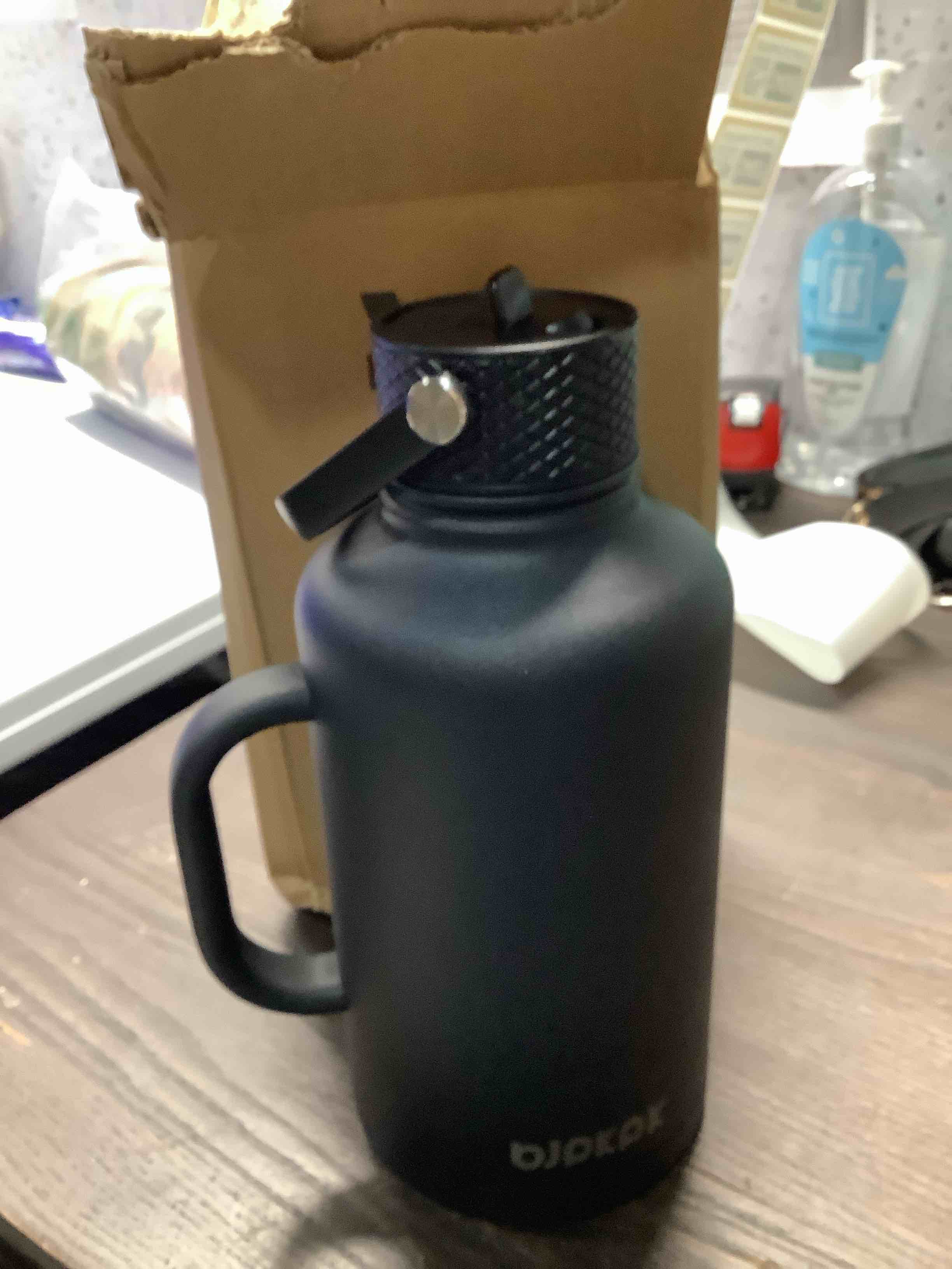 Condition photo showing Good Condition for BJPKPK Half Gallon Insulated Water Bottles with Straw Lid & Side Handle, 64oz Large, Stainless Steel Water Bottles with 3 Lids and Paracord Strap, Metal Water Jug,Black Black 64oz-Side Handle