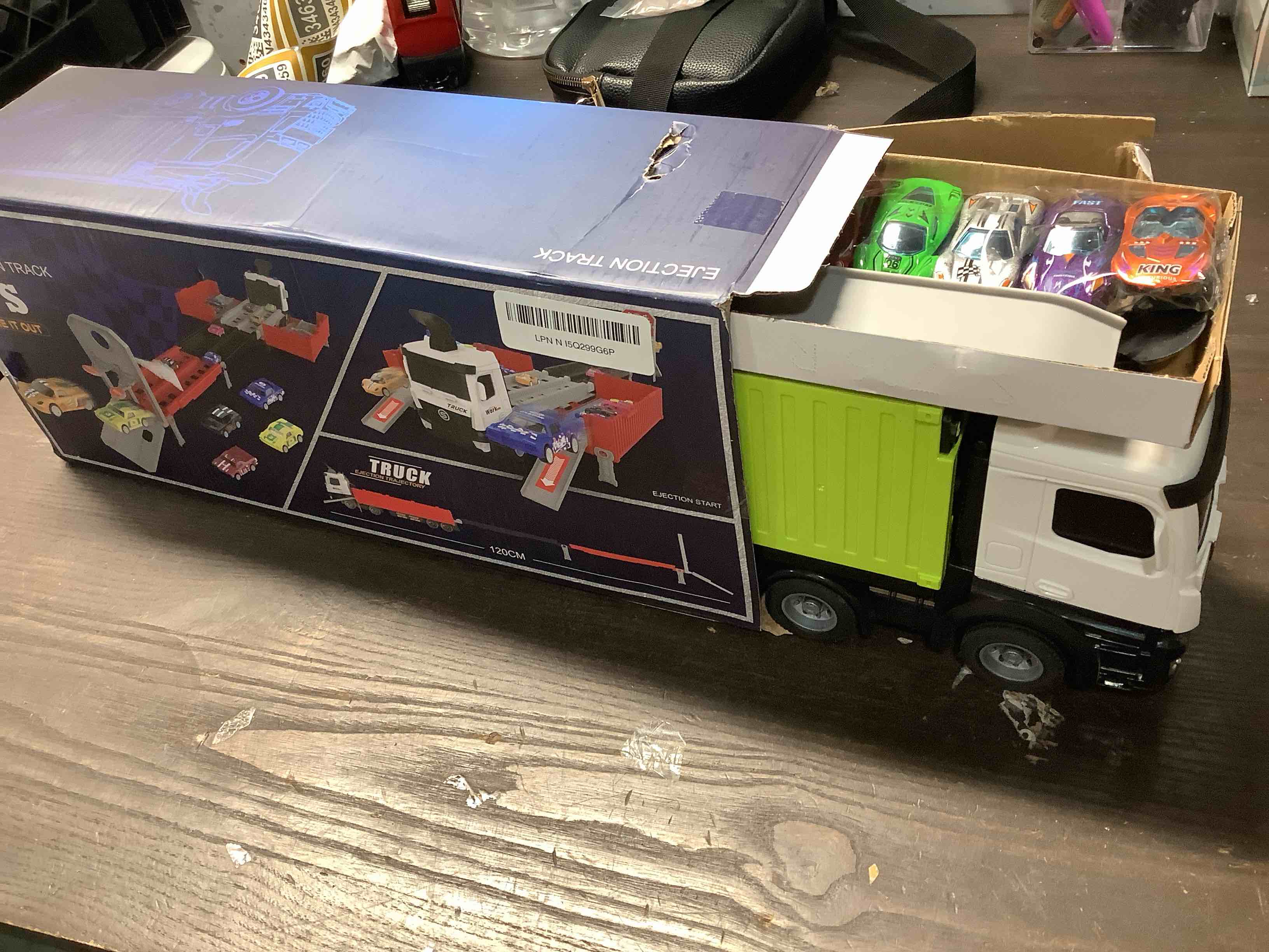 Condition photo showing Good Condition for Carrier Truck Race Track Boys Toys, Foldable 3 Layer Toddler Track Playset, Toy Truck Transport Car Carrier & 8 Race Cars, Truck Car Kids Toys for Age 3 4 5 6+ Years Old Boys Girls Green