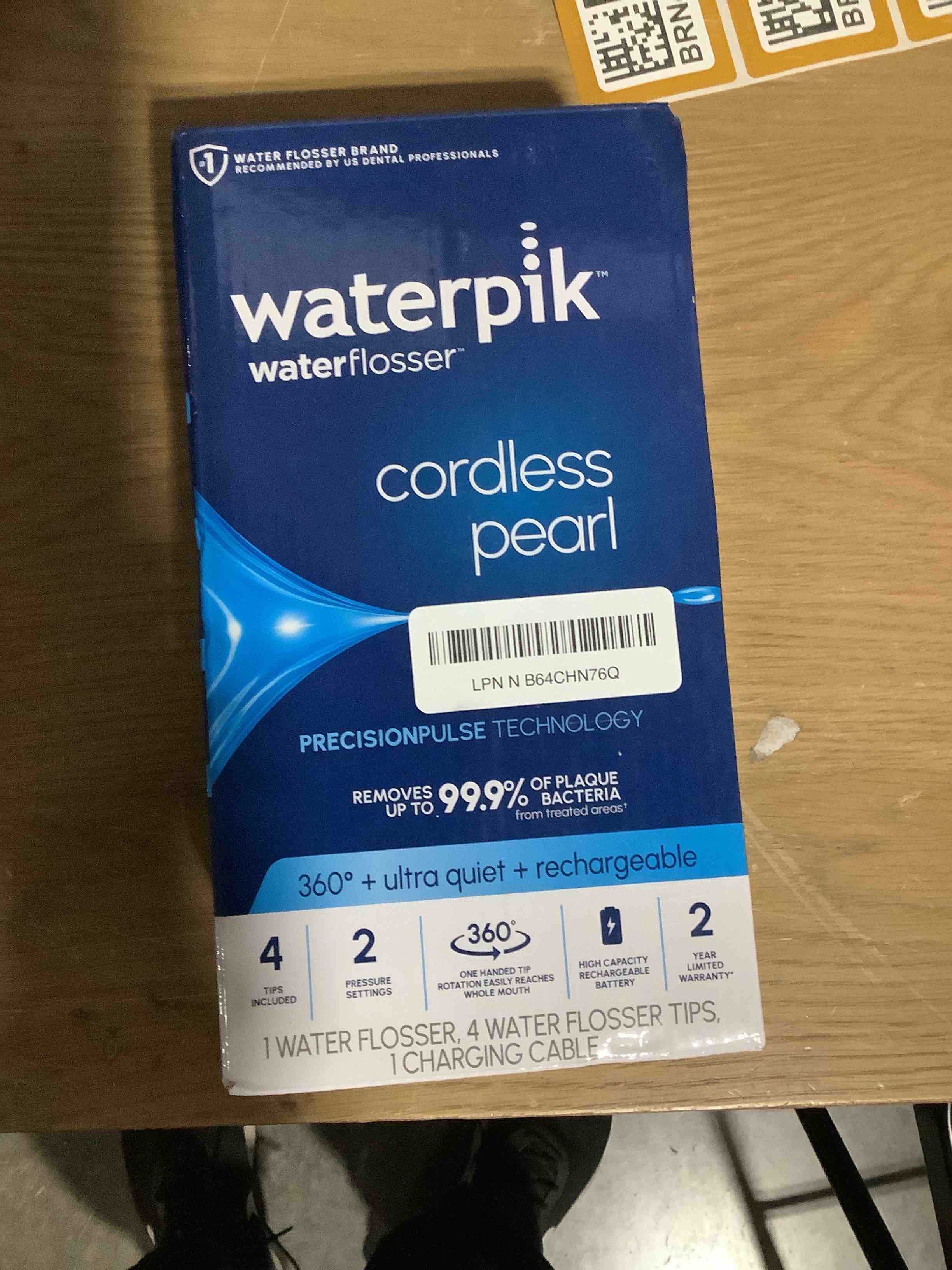 Condition photo showing New/Like New for Waterpik Cordless Pearl Rechargeable Portable Water Flosser for Teeth, Gums, Braces Care and Travel, Extra Quiet, 4 Flossing Tips - ADA Accepted, WF-13 White, Amazon Exclusive White 1 Count (Pack of 1)