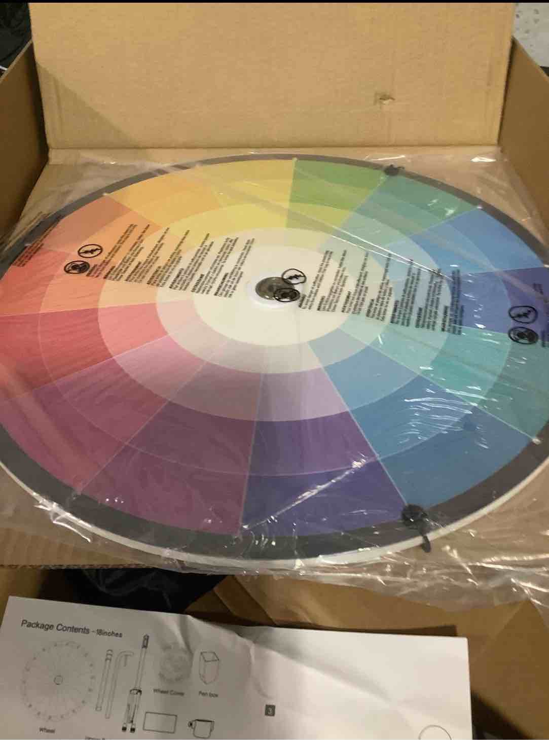 Condition photo showing Good Condition for ielyiesy 18-inch spinning prize wheel with unique gradient-patterned disc - 12 slots heavy-duty & editable fortune roulette. height-adjustable, ideal for carnivals, trade shows & events