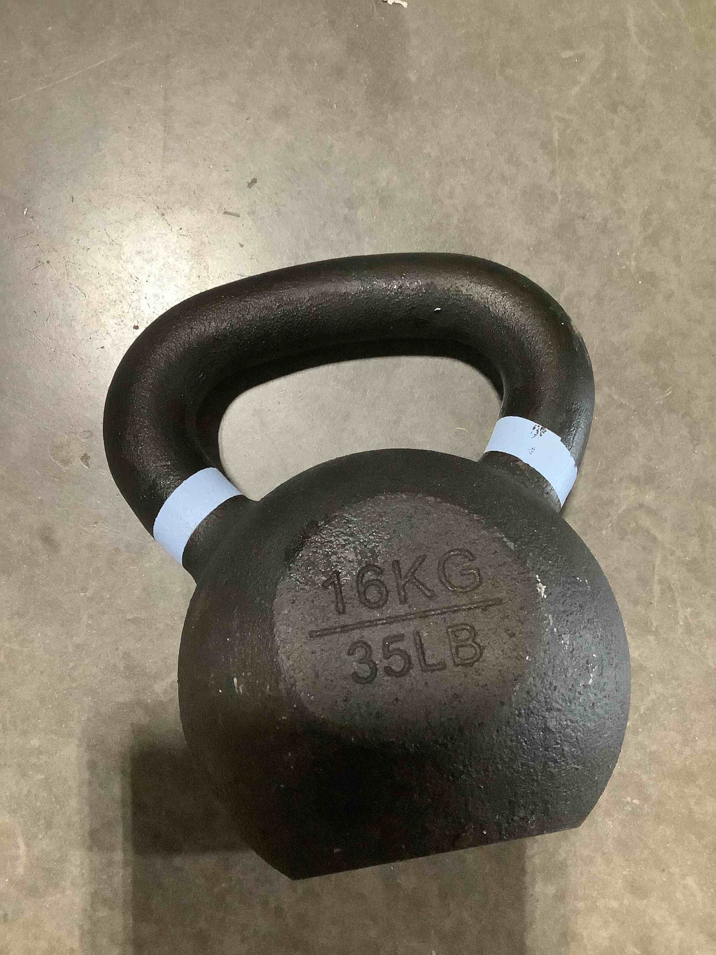 Condition photo showing As Is for amazon basics cast iron kettlebell 35 pounds