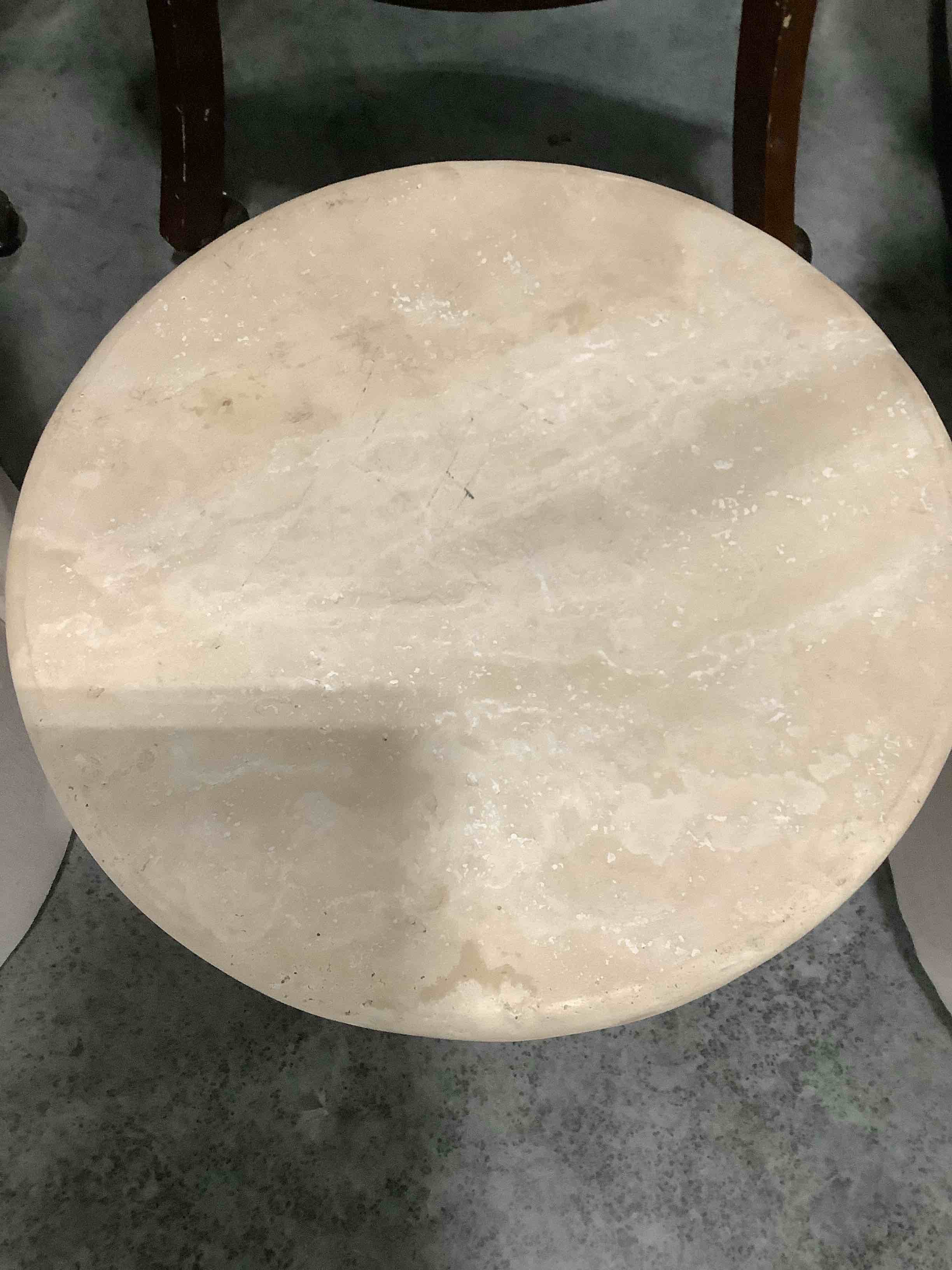 hearth and hand travertine table - new. may differ from picture since these are natural stone. approximately 16” tall. 16” across