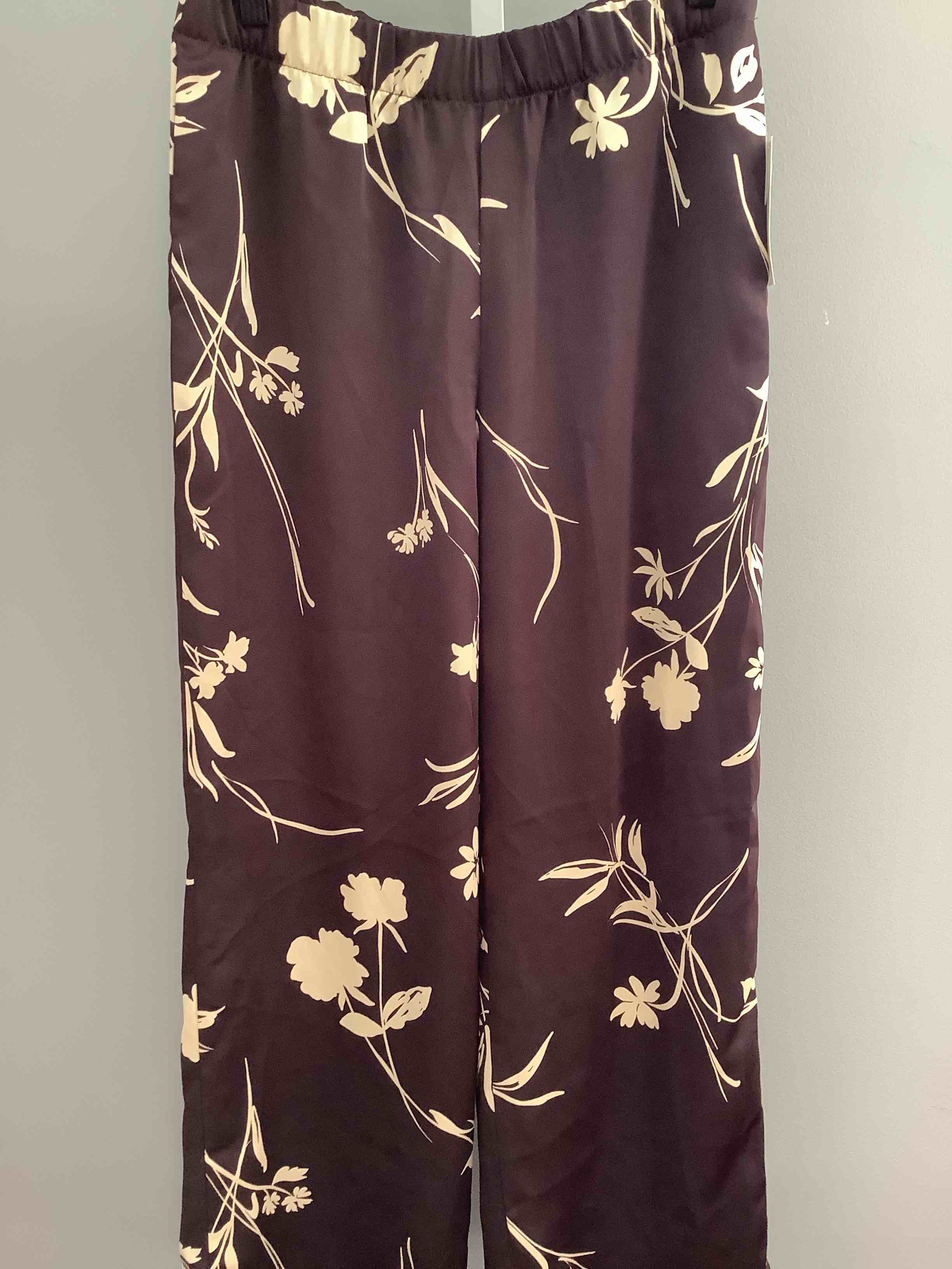 Condition photo showing New/Like New for a new day floral wide leg pants size xs