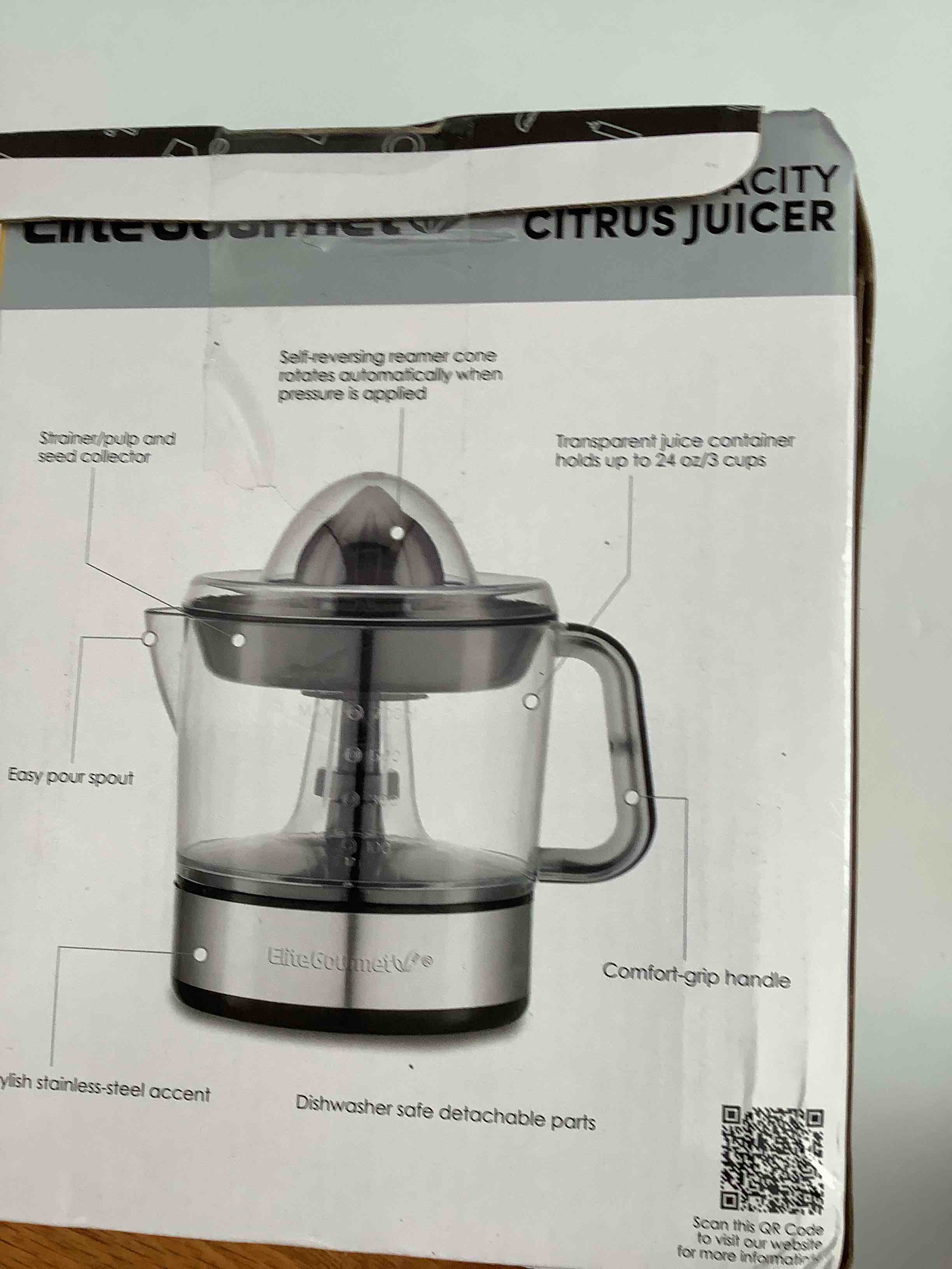 Condition photo showing As Is for elite gourmet ets623 bpa-free 40-watt electric citrus juicer, compact, large volume, pulp control, oranges, lemons, limes, grapefruits with easy pour spout, 24oz, black/stainless steel