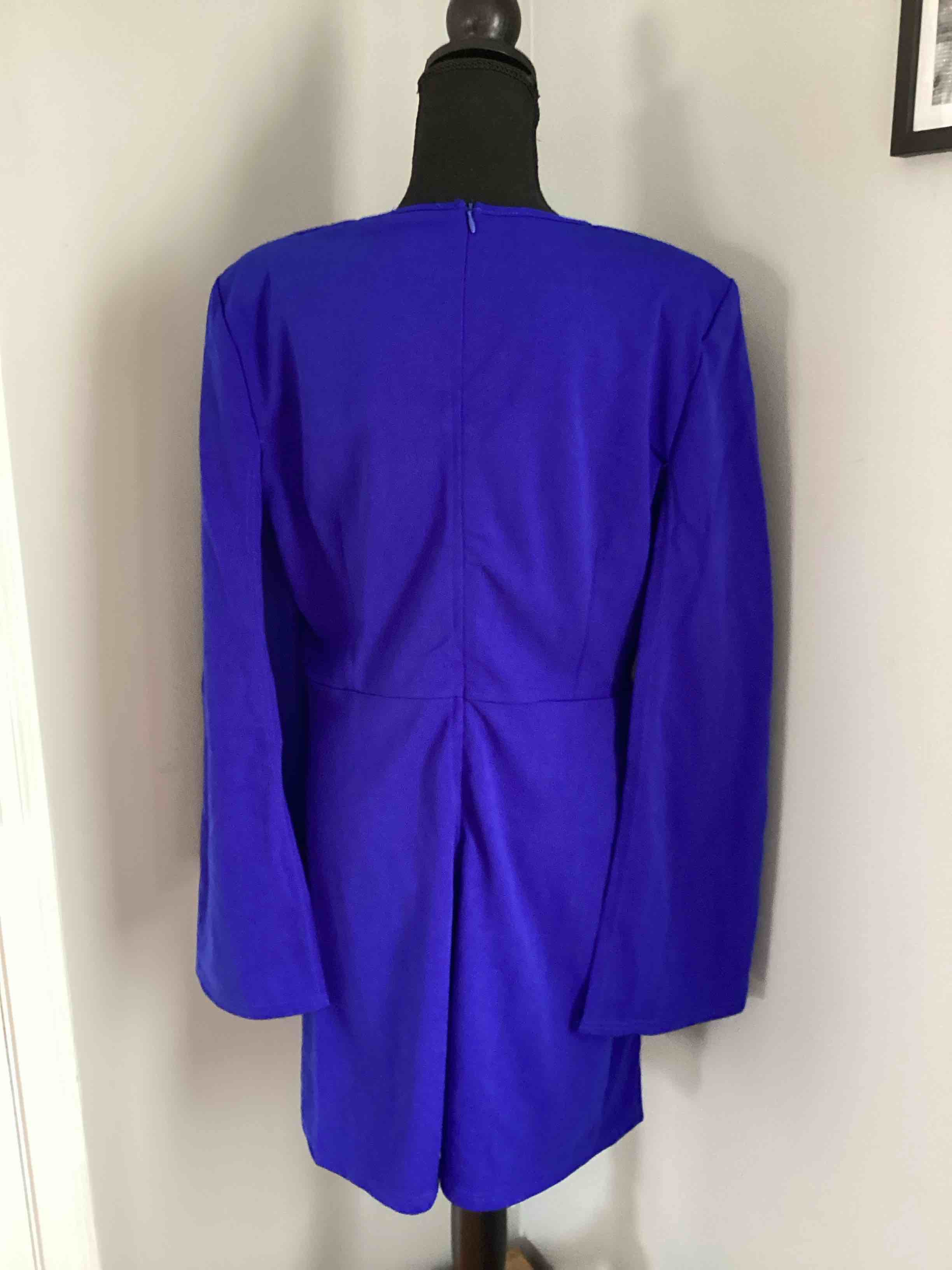 Condition photo showing Good Condition for shein ladies blue dress with pockets, zipper up in the back and bell sleeves size extra large