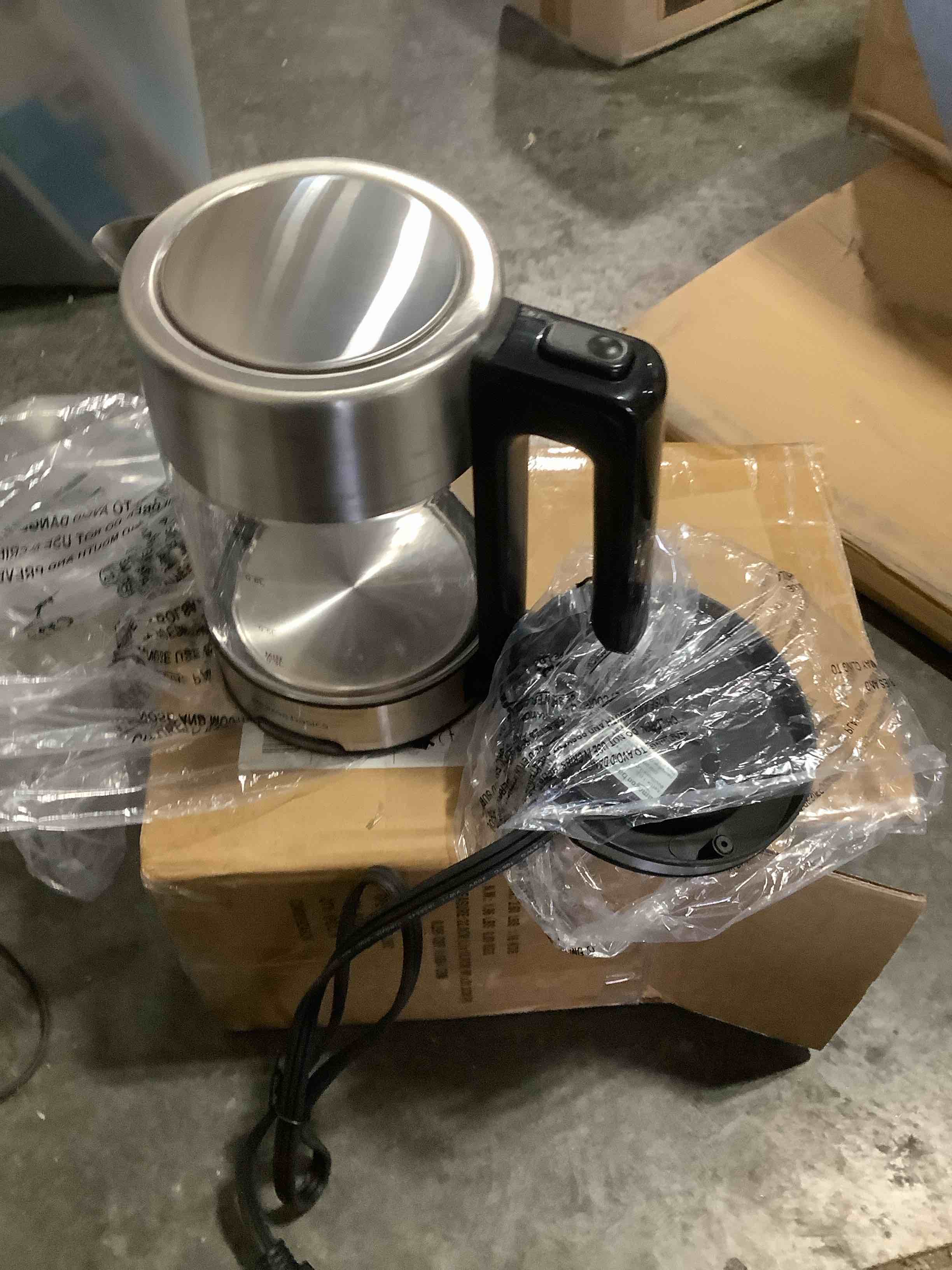 Condition photo showing Good Condition for Amazon Basics Electric Kettle with Glass Carafe for Tea and Coffee, BPA-Free, Fast Boiling, Auto Shut-Off, 1.7 Liter, 1500W, Black and Silver Glass Carafe 1.8 Quarts