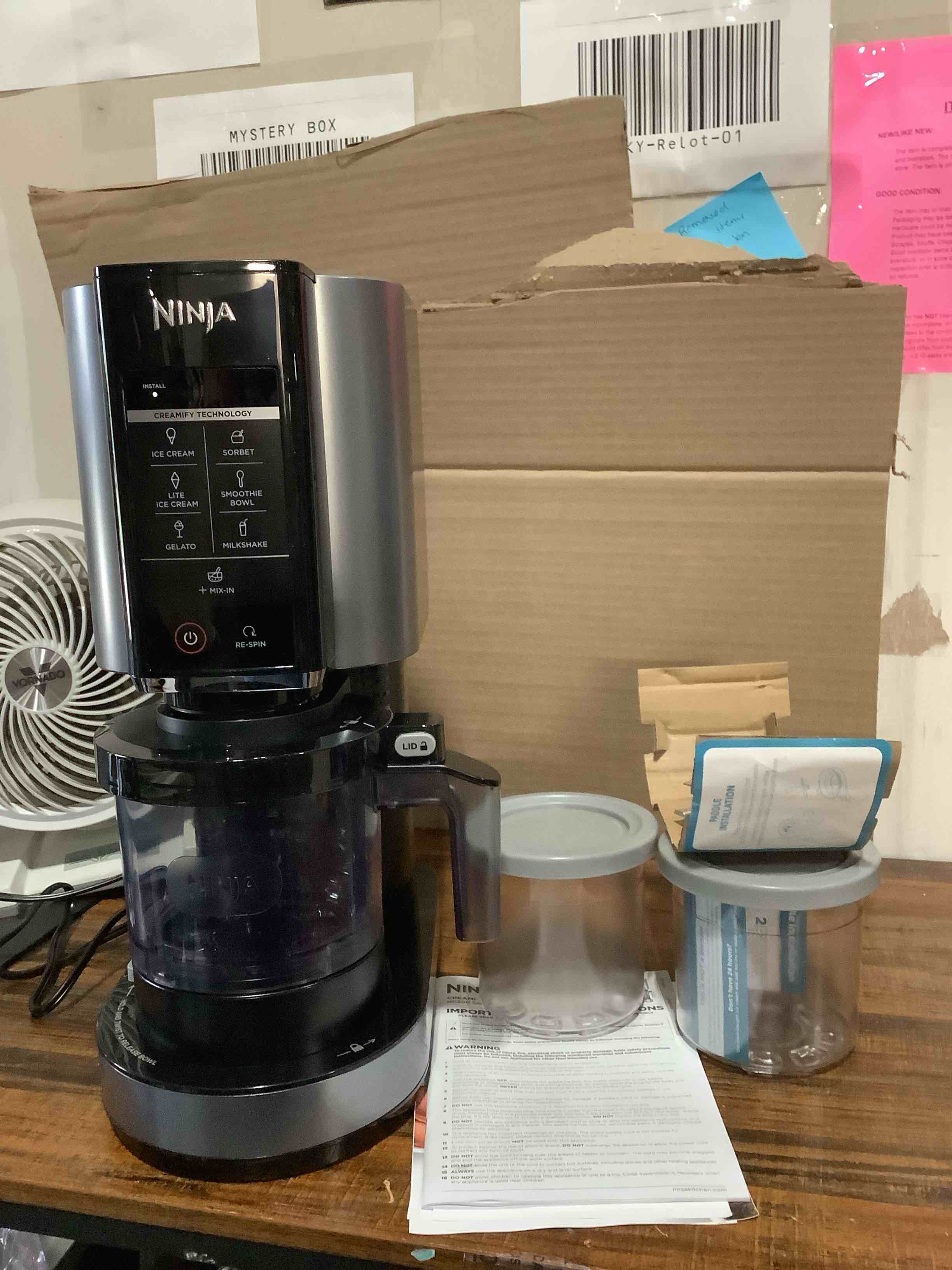 Condition photo showing Good Condition for Ninja NC301 CREAMi Ice Cream Maker, for Gelato, Mix-ins, Milkshakes, Sorbet, Smoothie Bowls & More, 7 One-Touch Programs, with (2) Pint Containers & Lids, Compact Size, Perfect for Kids, Silver