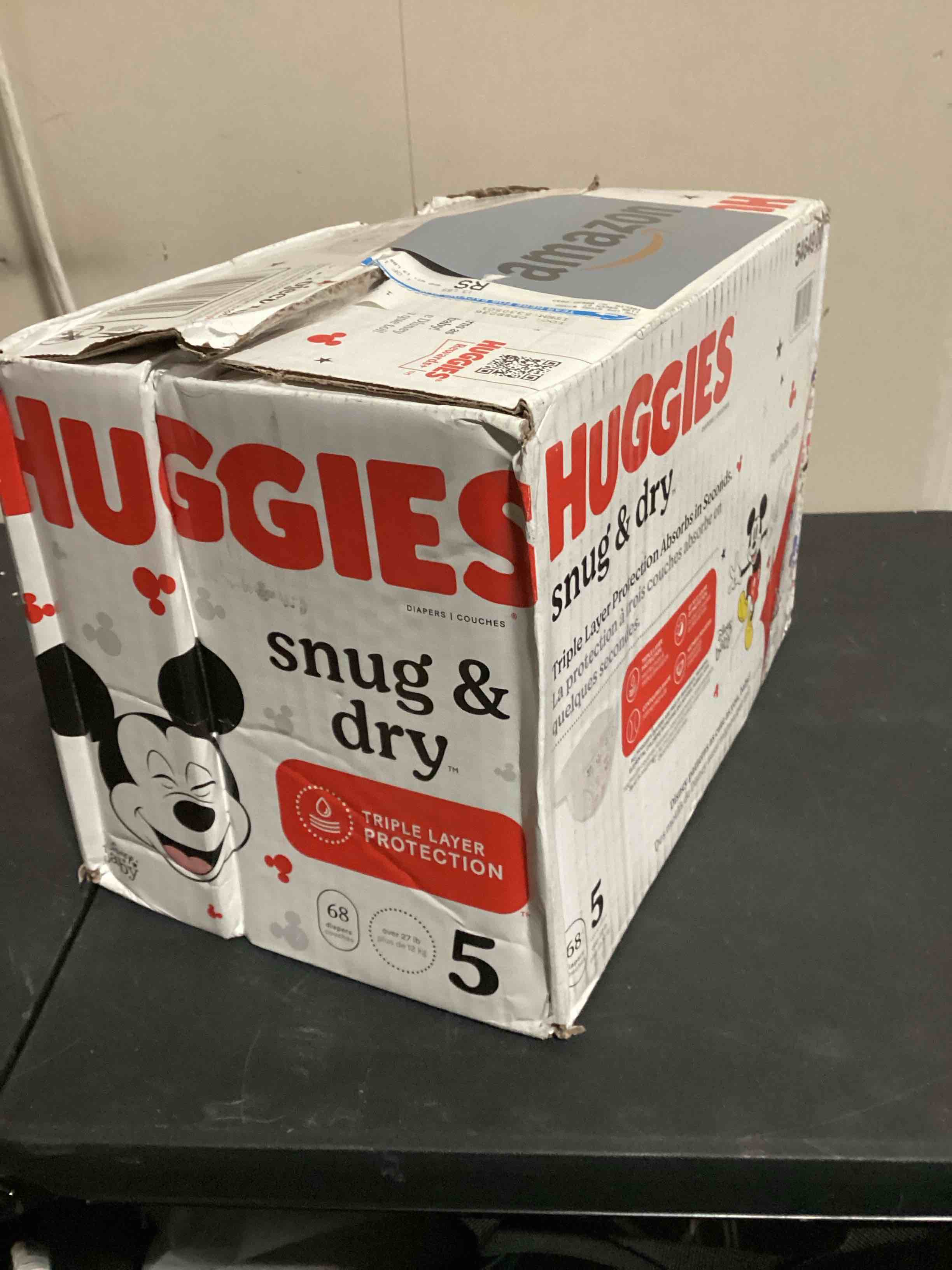 Condition photo showing New/Like New for huggies size 5 diapers, snug & dry baby diapers, size 5 (27+ lbs), 68 count
