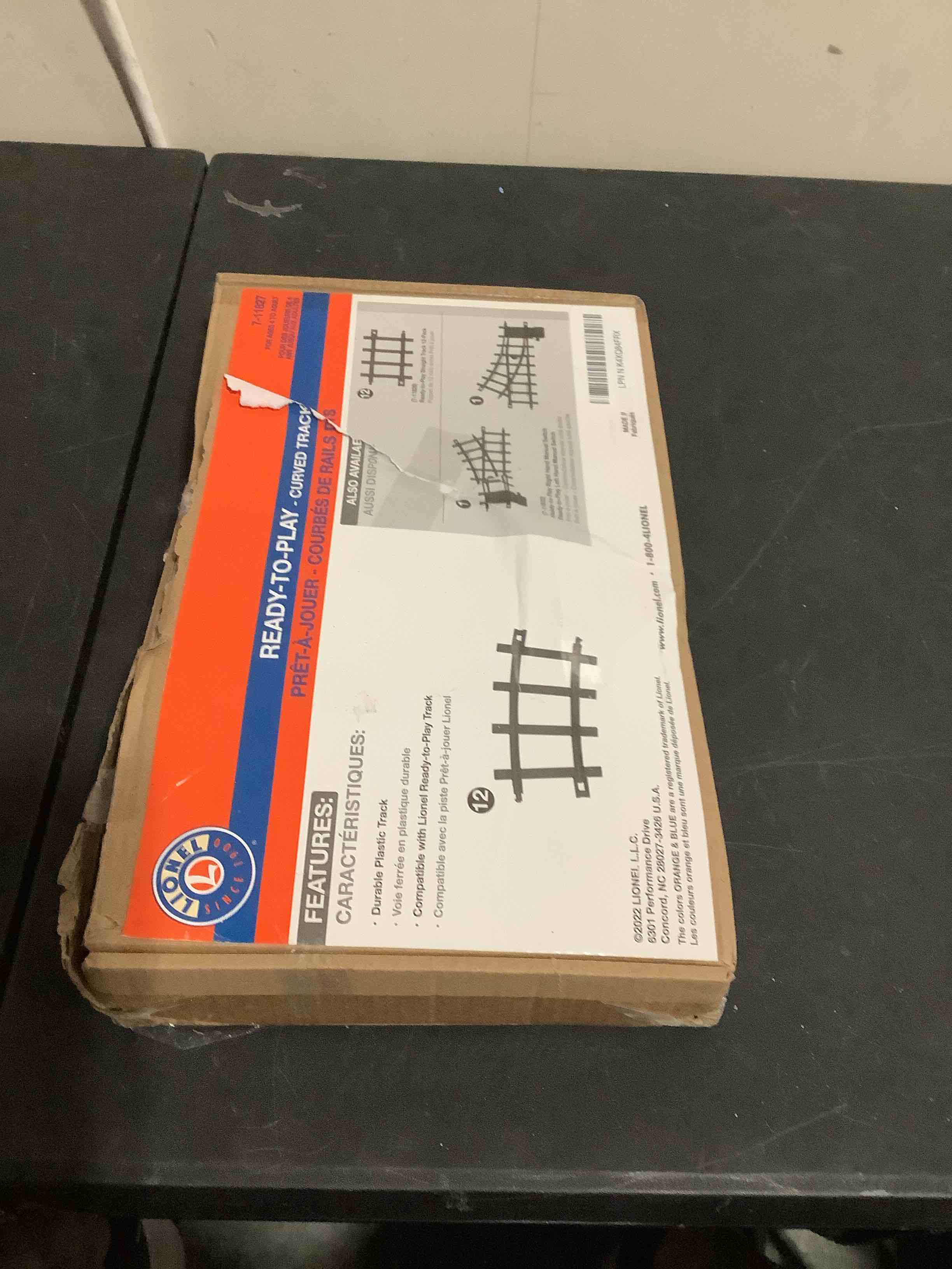 Condition photo showing New/Like New for lionel ready-to-play inner loop 10 piece model train track pack – black 2-rail plastic ready-to-play expansion track for battery-powered 1:24 scale train sets, ages 4+