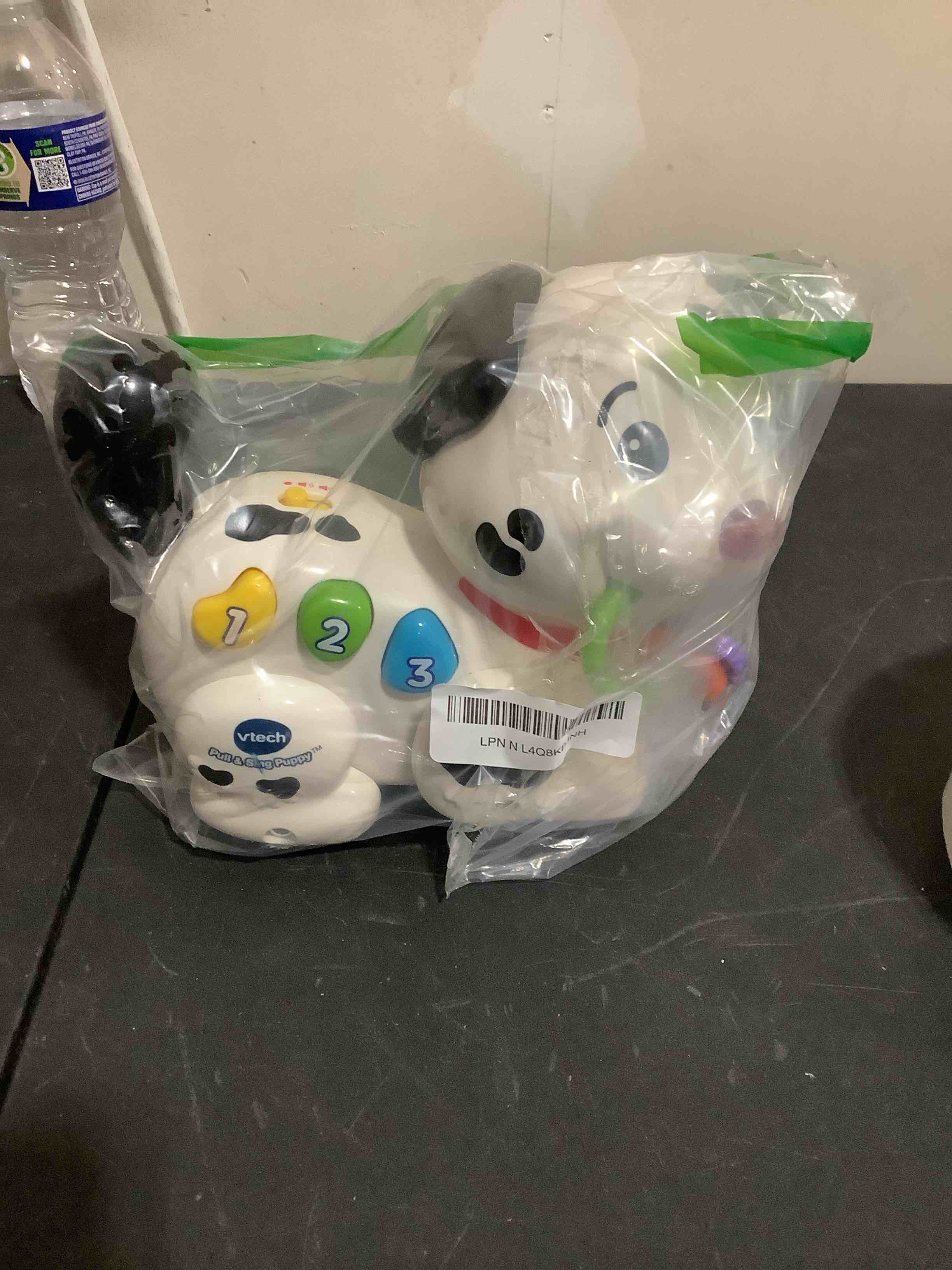 Condition photo showing New/Like New for vtech pull and sing puppy