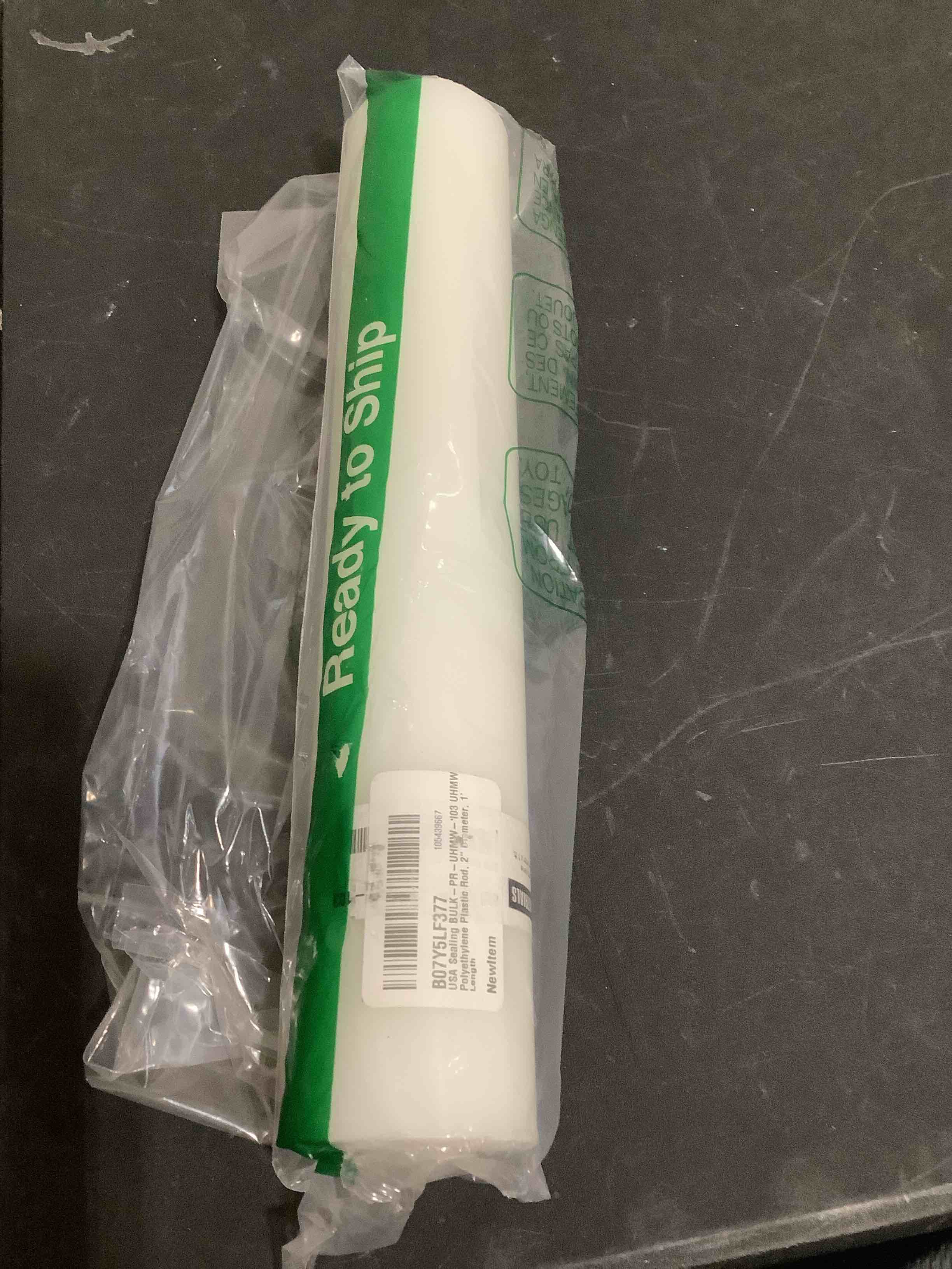 Condition photo showing New/Like New for usa sealing bulk-pr-uhmw-103 uhmw polyethylene plastic rod, 2" diameter, 1' length