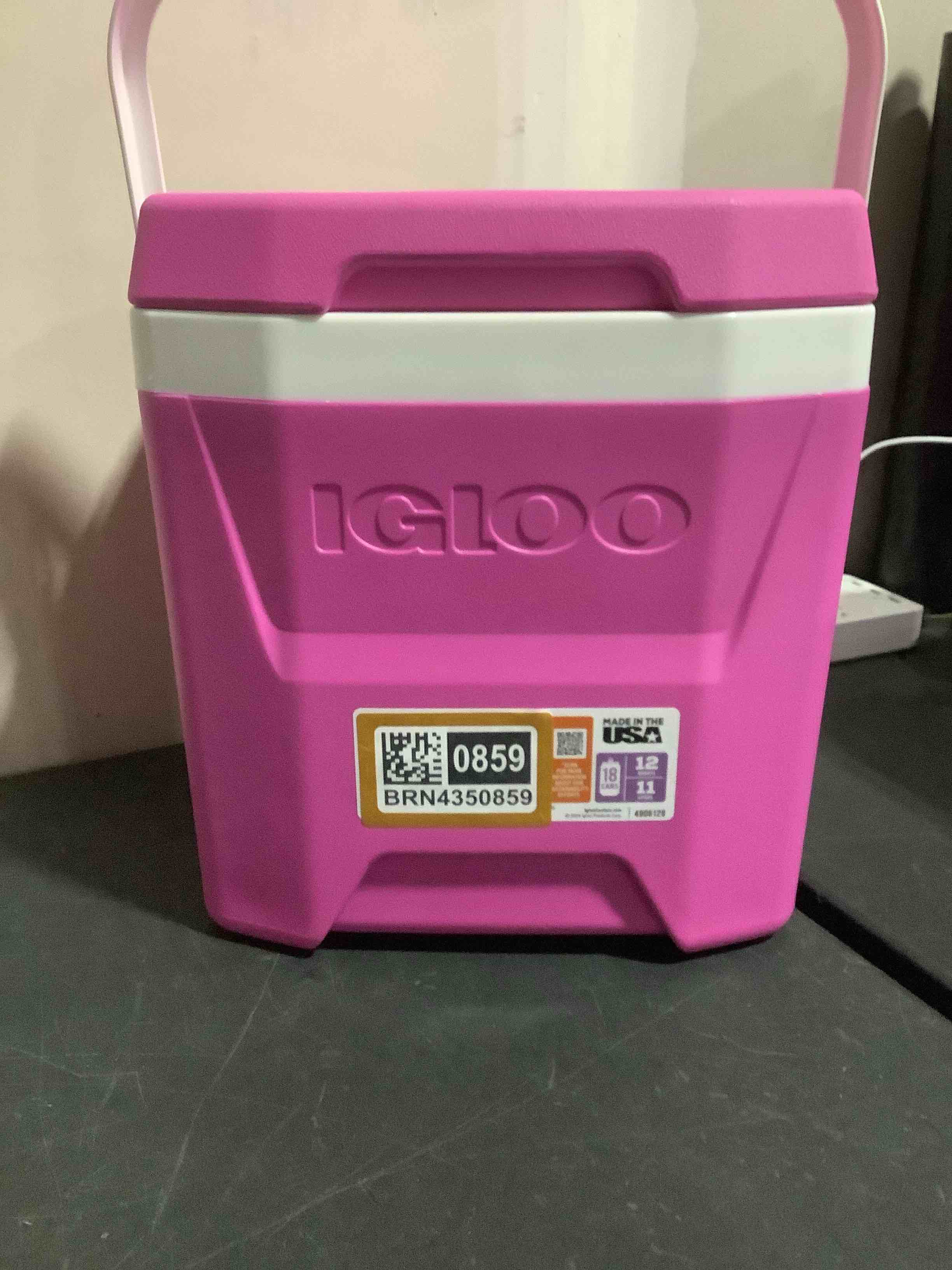 Condition photo showing New/Like New for *color is pink* igloos cooler hard-sided ice chest, insulated portable cooler, heavy-duty, leak-resistant lid, lightweight ergonomic handle
