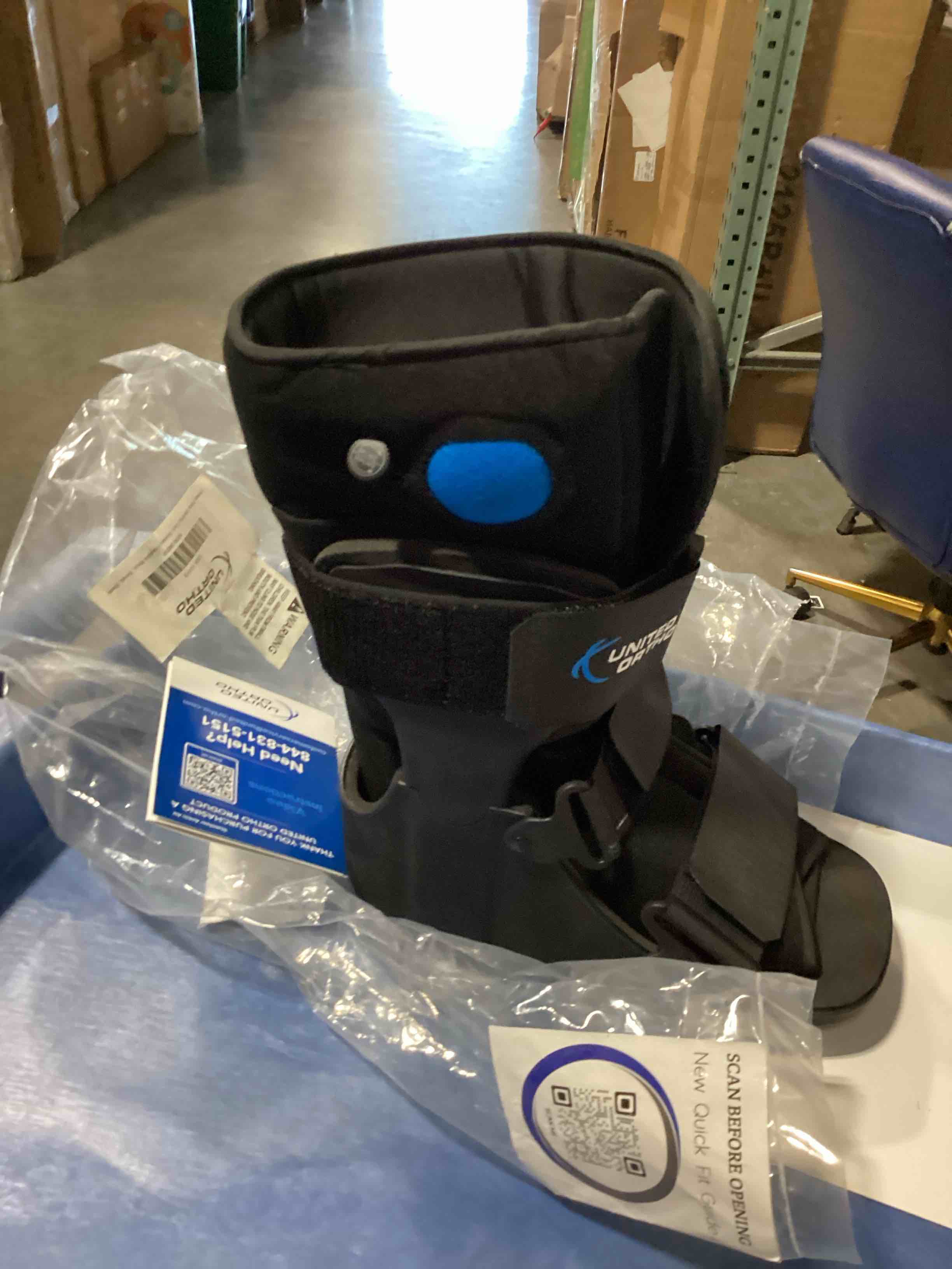 Condition photo showing New/Like New for united ortho short air cam walker fracture boot, small, black black small boot