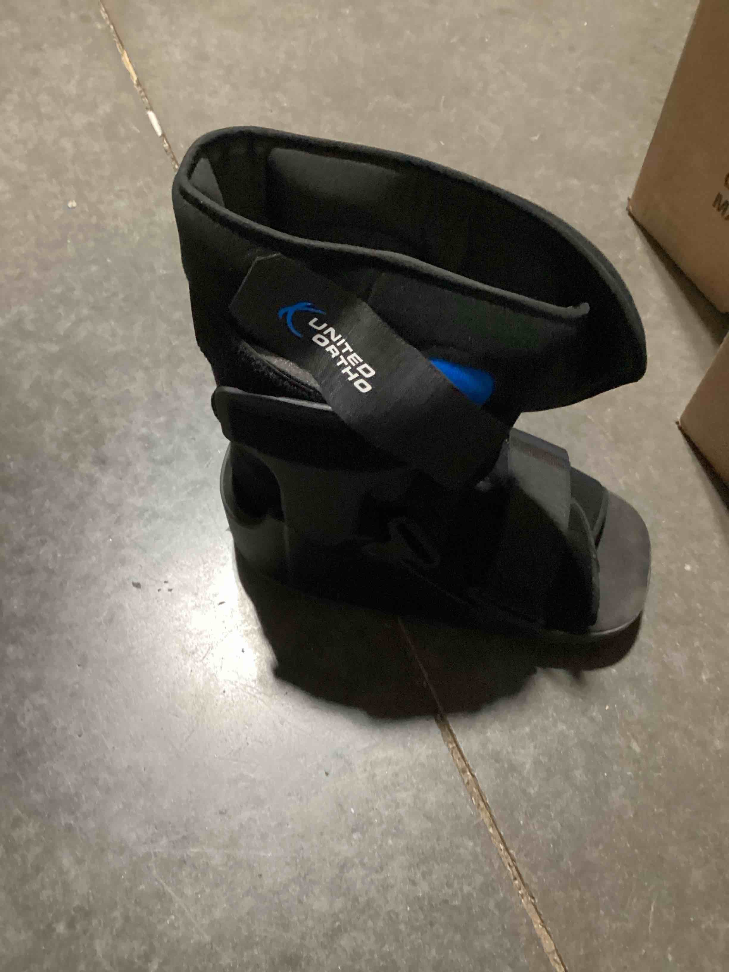 Condition photo showing Good Condition for united ortho short air cam walker fracture boot, large, black black large boot