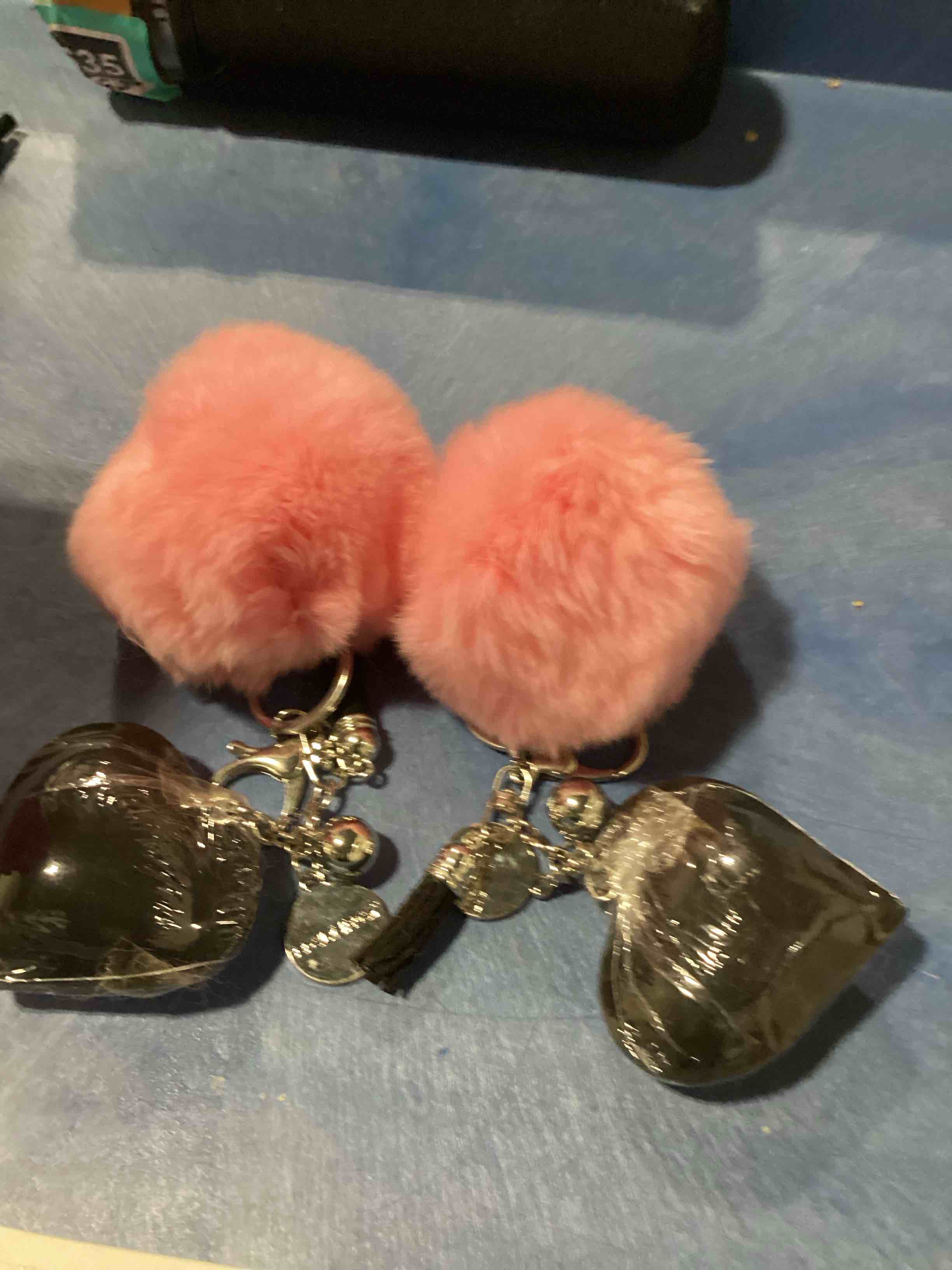 Condition photo showing New/Like New for bundle pack of two color is light pink with black rhinestone heart pom pom keychain pendant with tassel crystal rhinestone