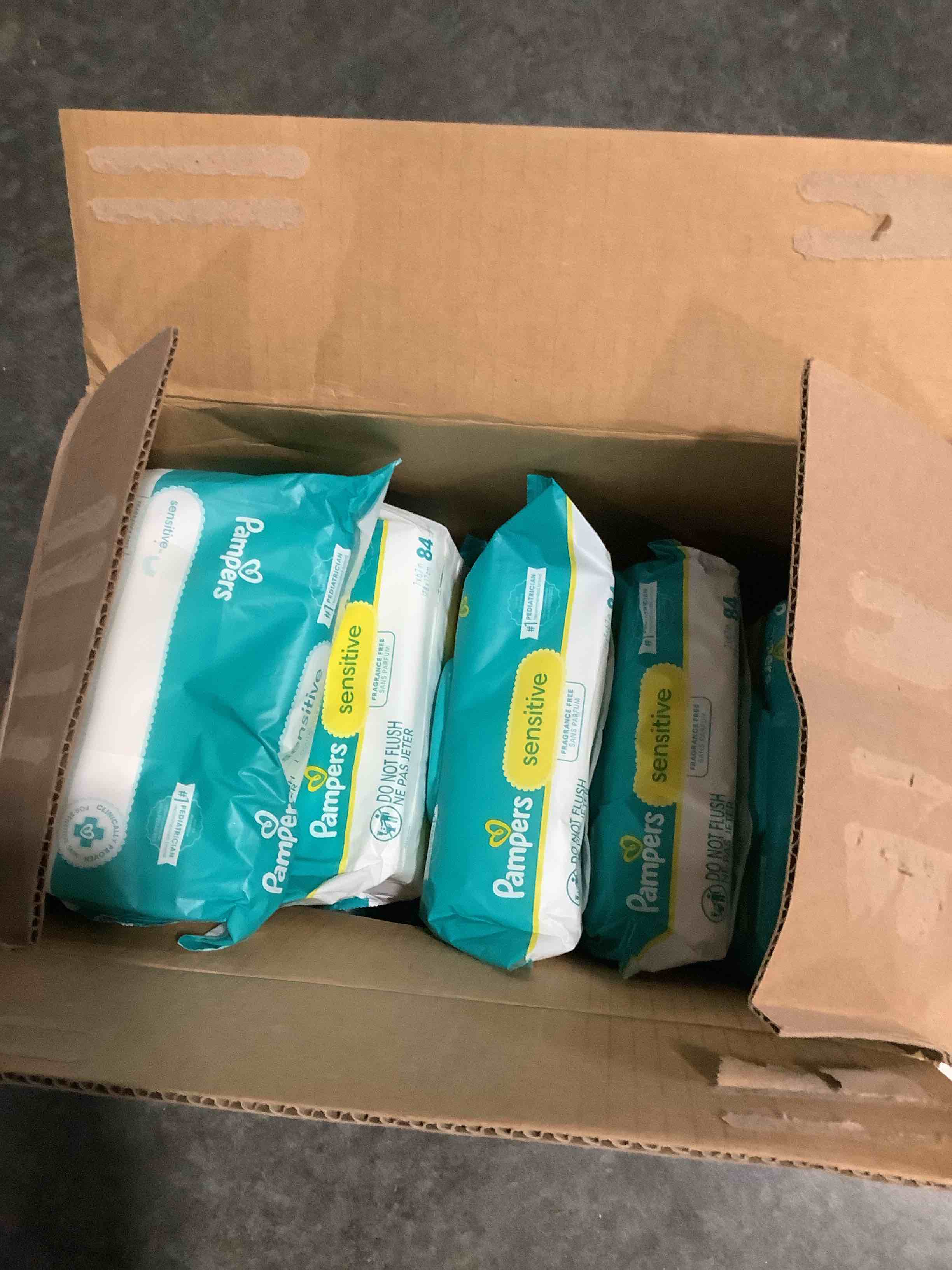 Condition photo showing New/Like New for pampers sensitive, baby wipes, 1008 wipes. total includes pop-up packs as well as refills.