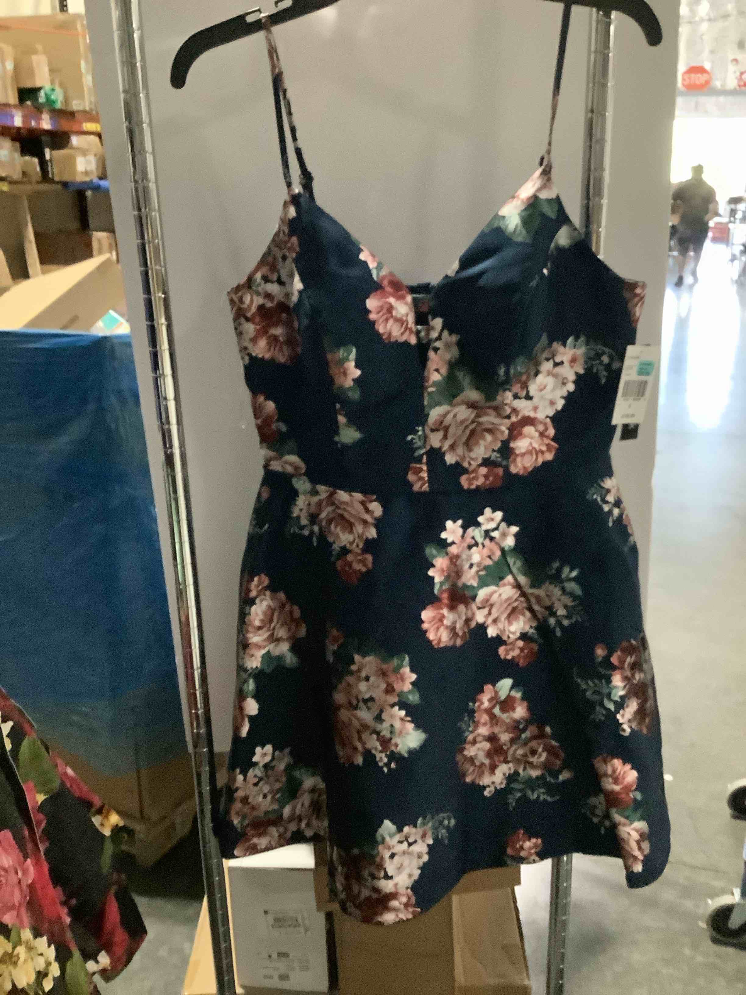 Condition photo showing New/Like New for juniors navy blue floral fit and flare cocktail dress spaghetti strap size 9