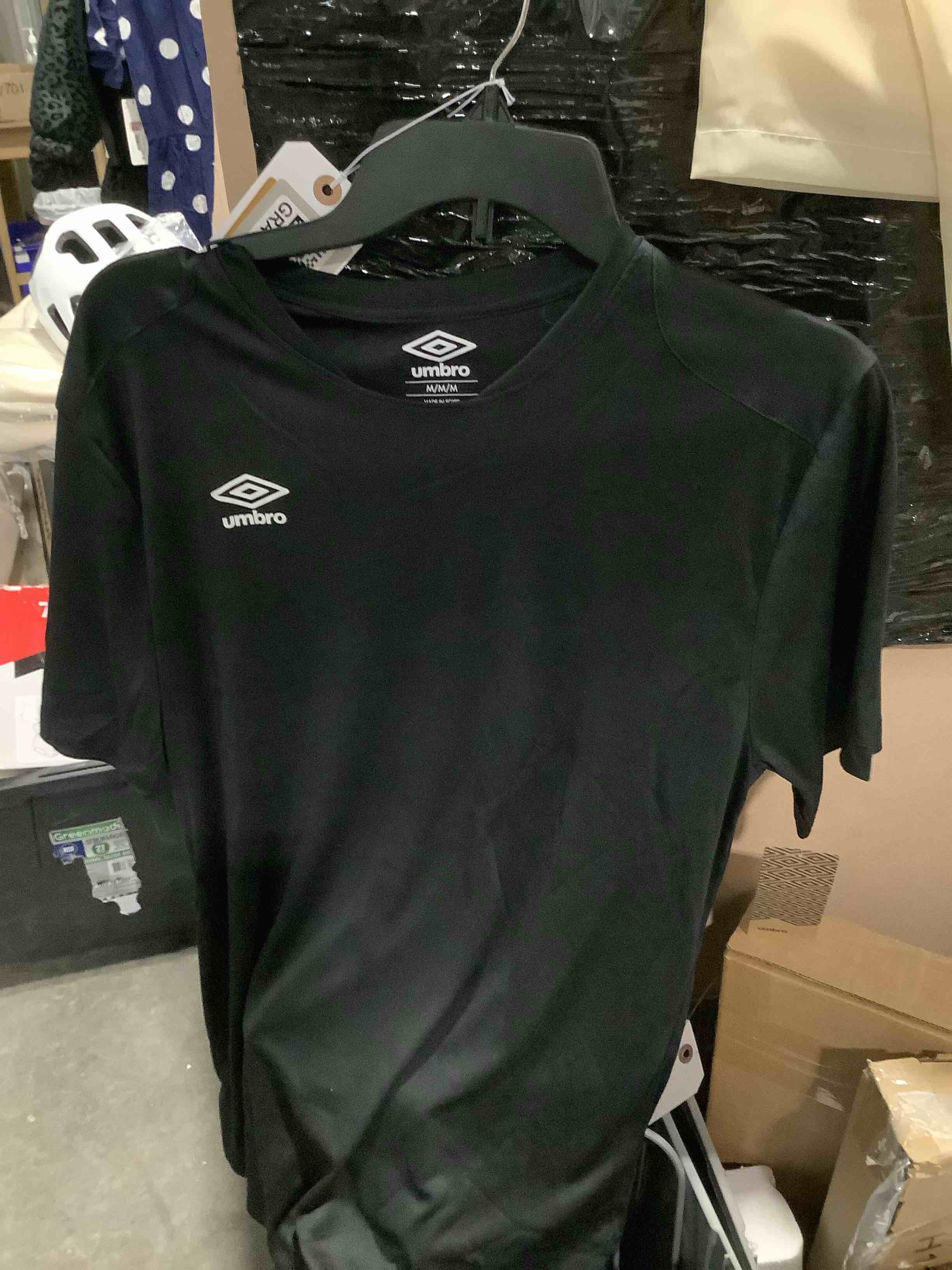 Condition photo showing New/Like New for umbrella, shirt, size medium