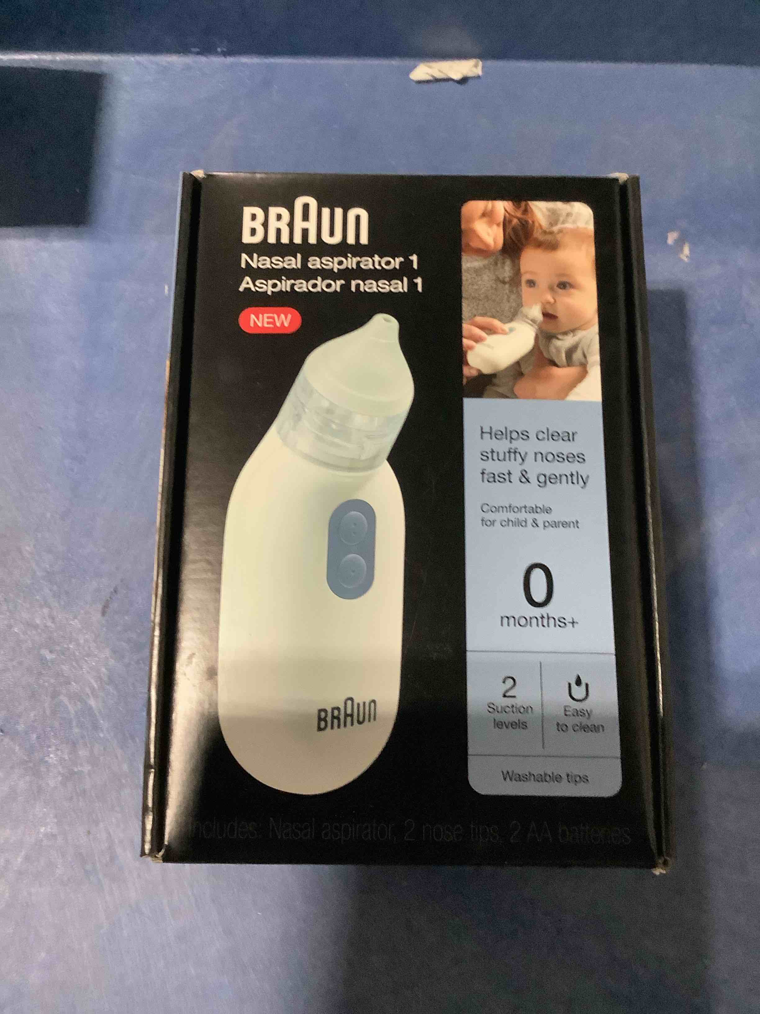 Condition photo showing New/Like New for braun nasal aspirator, battery powered