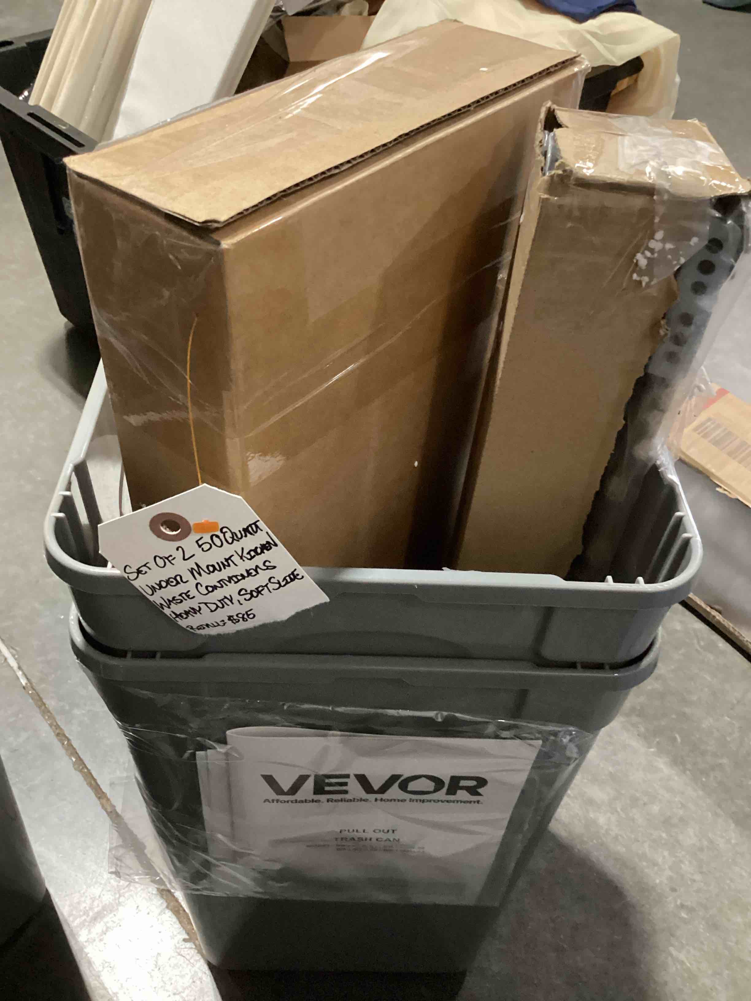 Condition photo showing New/Like New for vevor pull-out trash can, 50 qt x2 double under mount kitchen waste container, heavy duty garbage recycling bin with door kit and soft close slide, for kitchen cabinet, sink, under counter (grey)