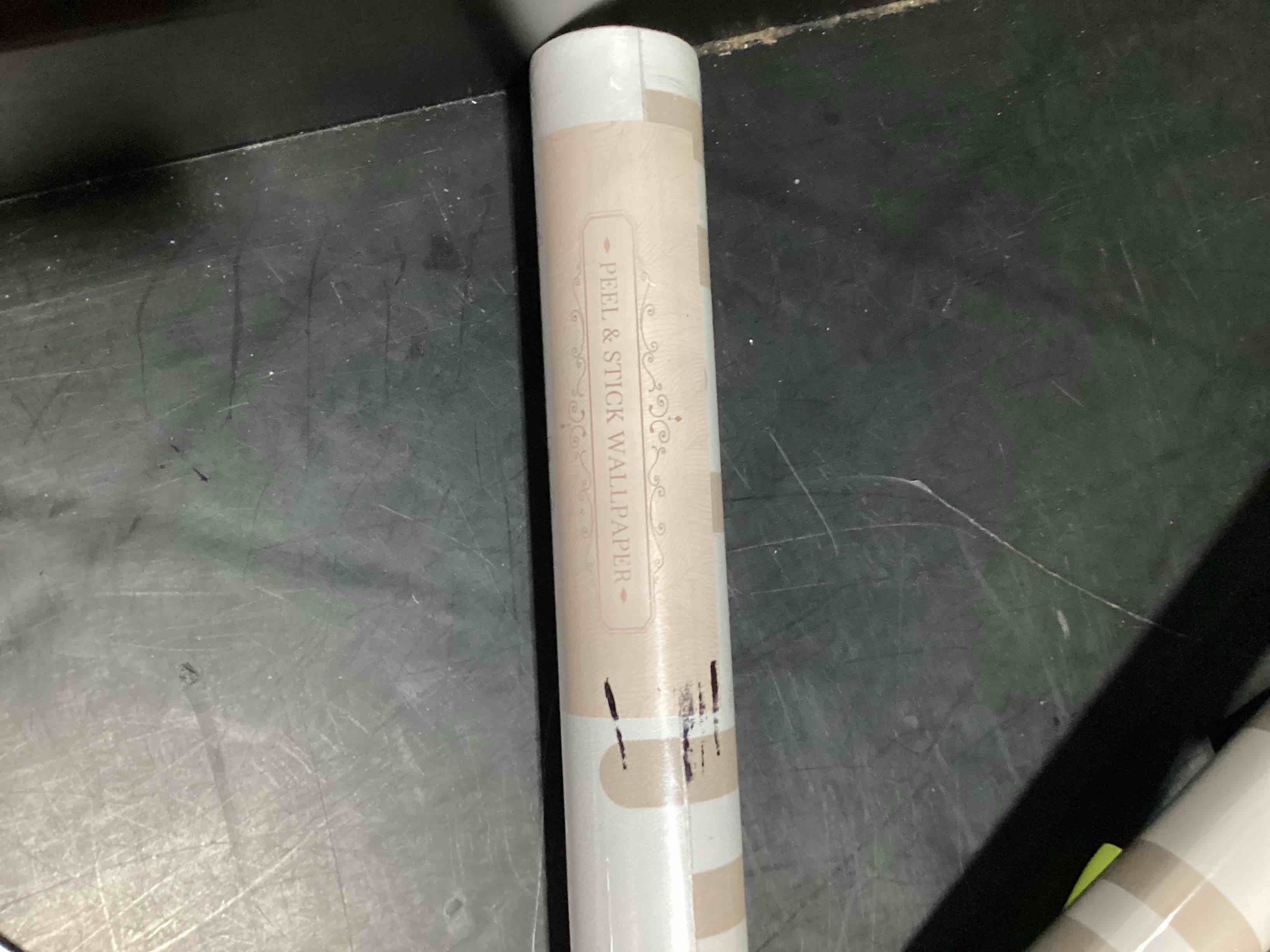 Condition photo showing New/Like New for rugrat peel and stick wallpaper
