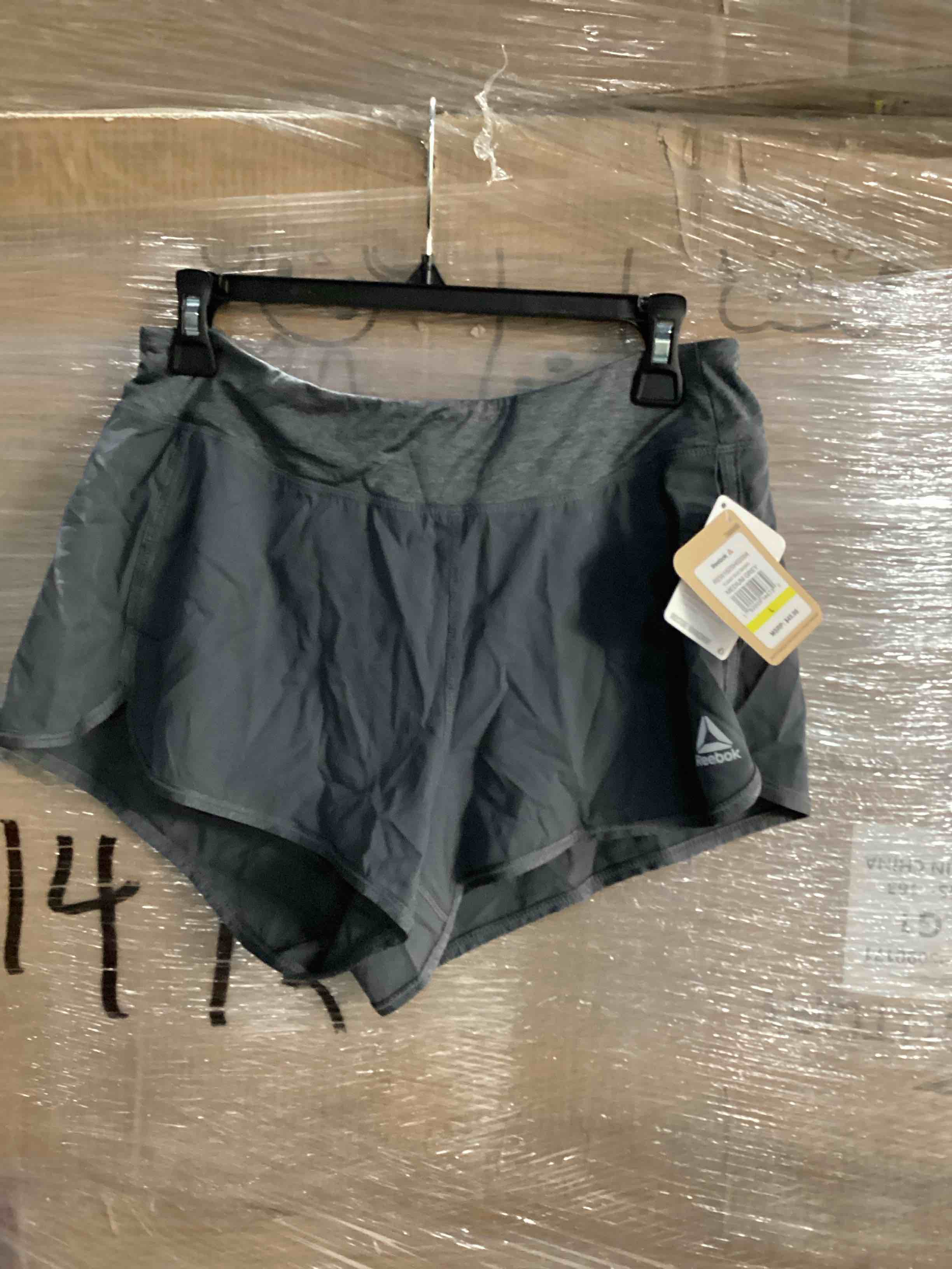 Condition photo showing New/Like New for similar product reebok womens cardio running athletic workout shorts