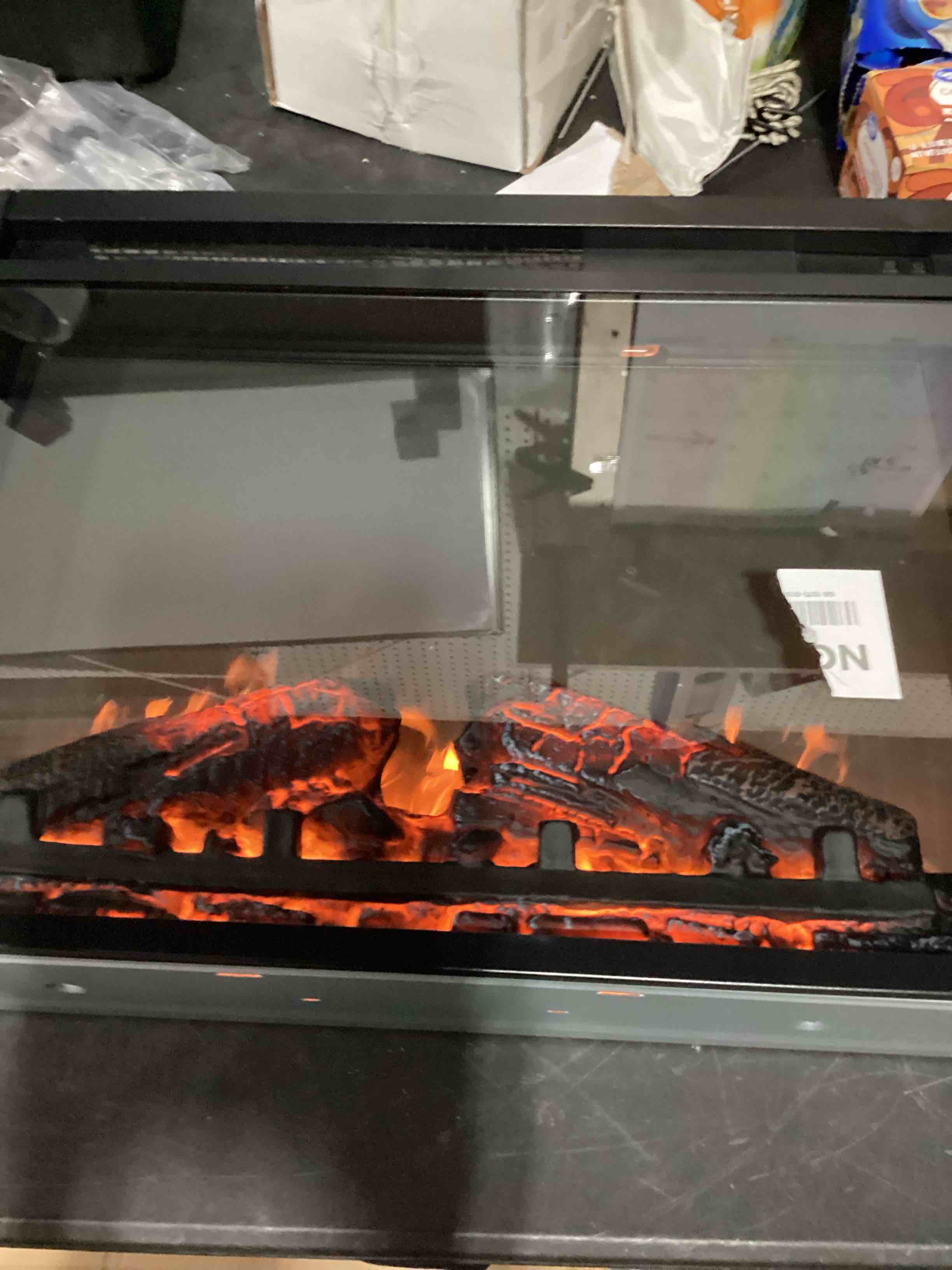 Condition photo showing As Is for 23" electric fireplace insert, fireplace heater with remote, adjustable 4 flame brightness, log set, low noise, 8h timer, overheating protection, 1400w (23" x 19.7")