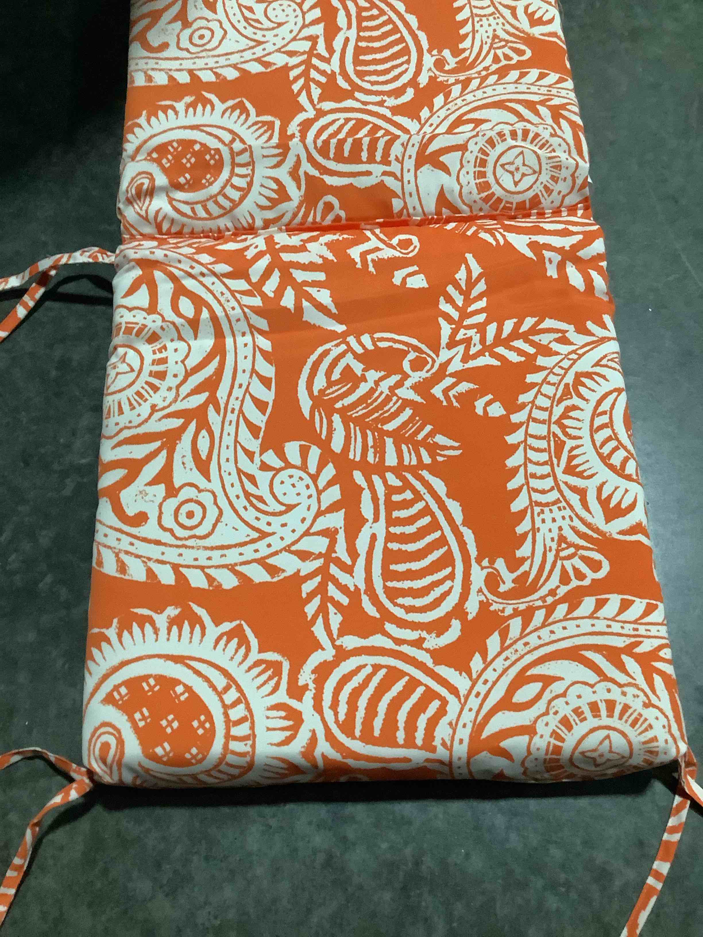 Condition photo showing New/Like New for orange white pillow perfect paisley indoor/outdoor solid back 1 piece square corner chair cushion with ties, deep seat, weather, and fade resistant, 36.5" x 18", yellow/ivory addie,