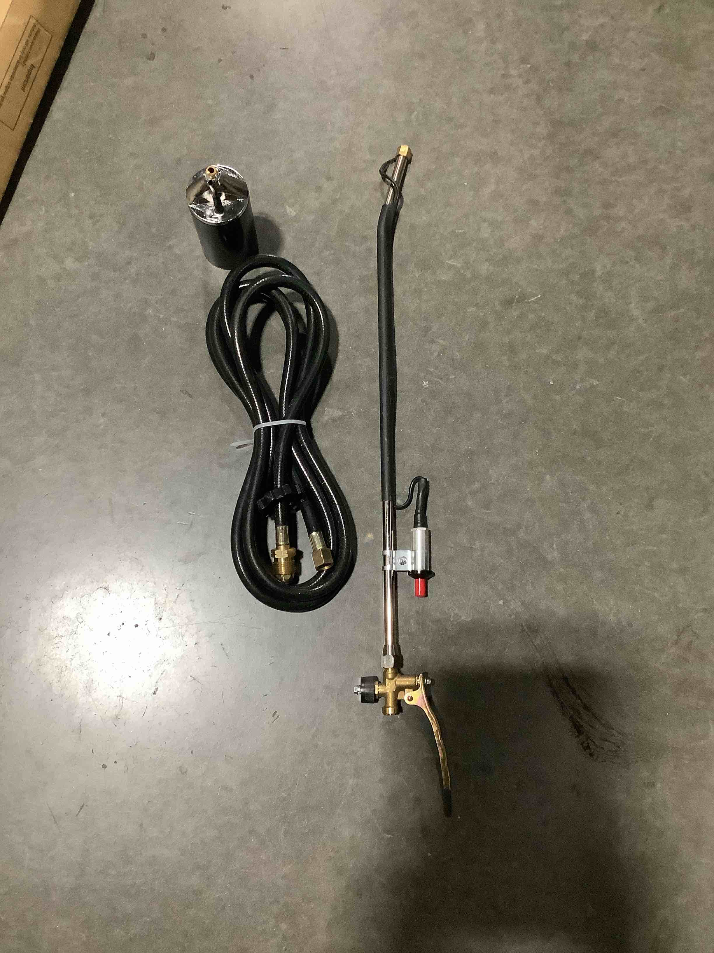 Condition photo showing As Is for similar product flame king propane torch kit heavy duty weed burner, 500,000 btu with flint striker, with 10-ft hose regulator assembly