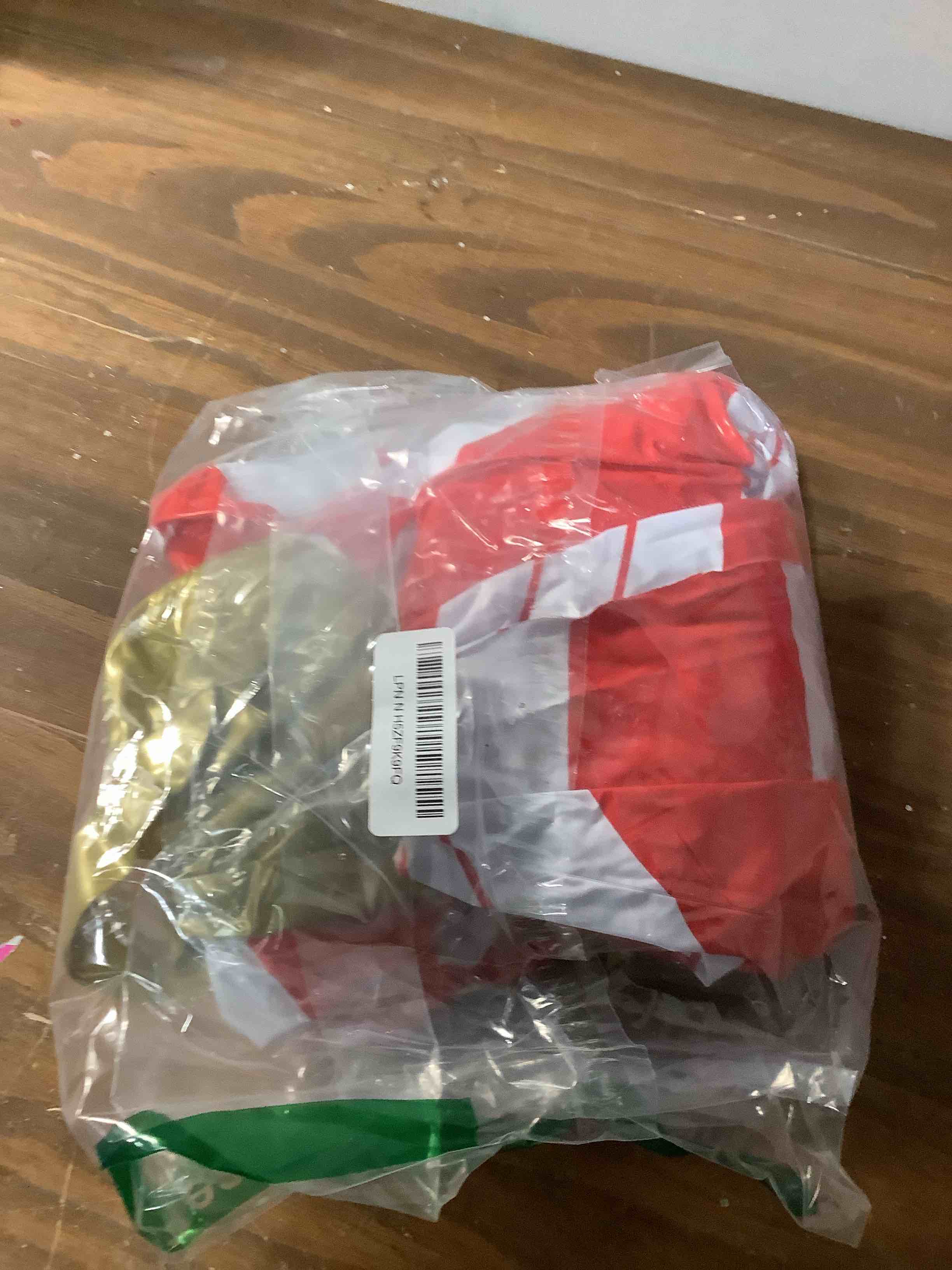 Condition photo showing Good Condition for 2 Pieces 32 Inch Giant PVC Inflatable Christmas Decorated Ball Ornaments Outdoor Large Xmas Blow Ball Decorations for Christmas Themed Party Ornaments(Candy,Red White) Candy Red and White