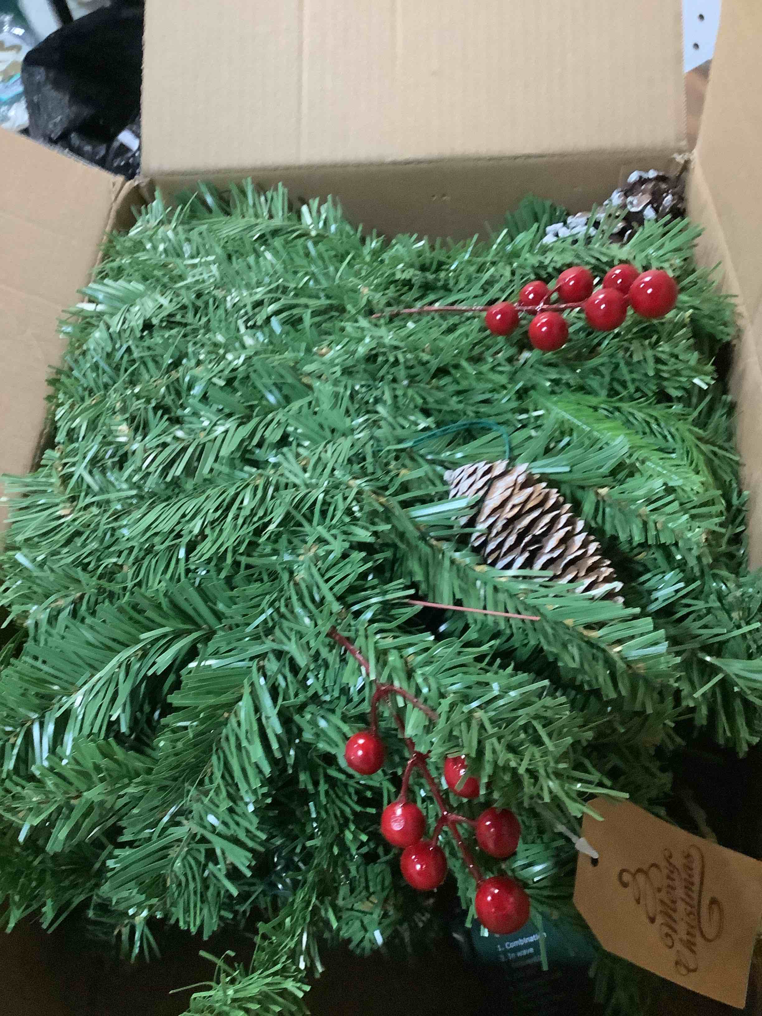 Condition photo showing Good Condition for Pre-lit Christmas Garland 9FT with 100 Warm Lights, Battery Operated Xmas Garland with Pine Cedar Cones & Red Berries, Christmas Decoration for Mantle Fireplace Stair Railing Porch Classic Garland