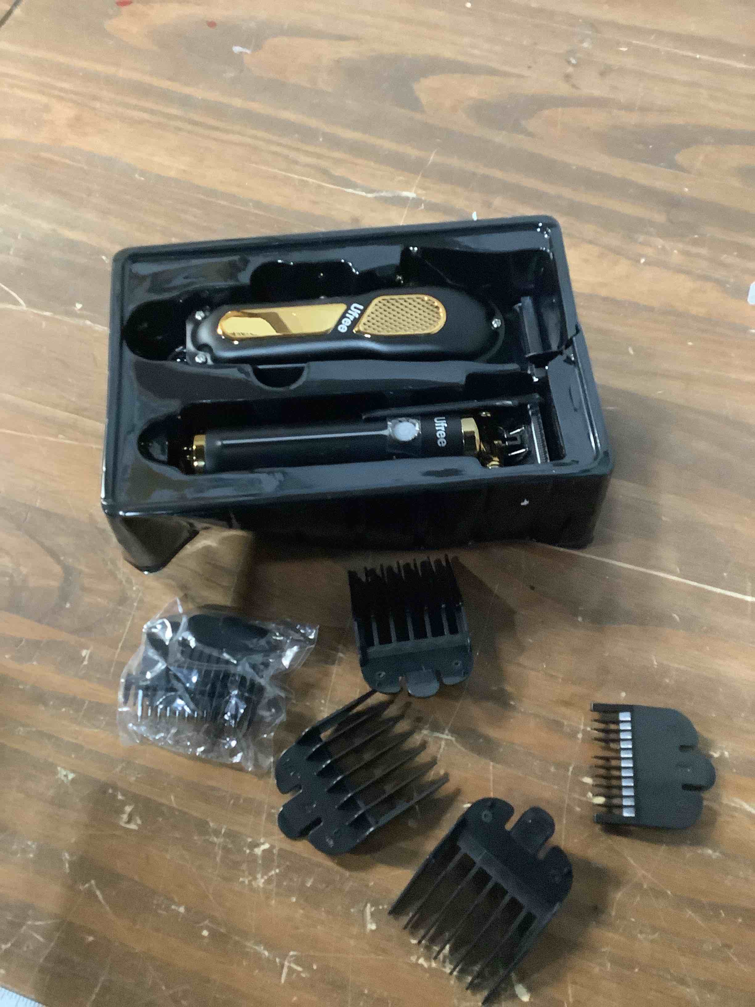 Condition photo showing Good Condition for Ufree Hair Clippers for Men, Professional Clippers and Trimmers Set, Cordless Clippers for Hair Cutting, Beard Trimmer, Barber Clippers, Rechargeable Electric Shaver, Gifts for Men, Black Gold