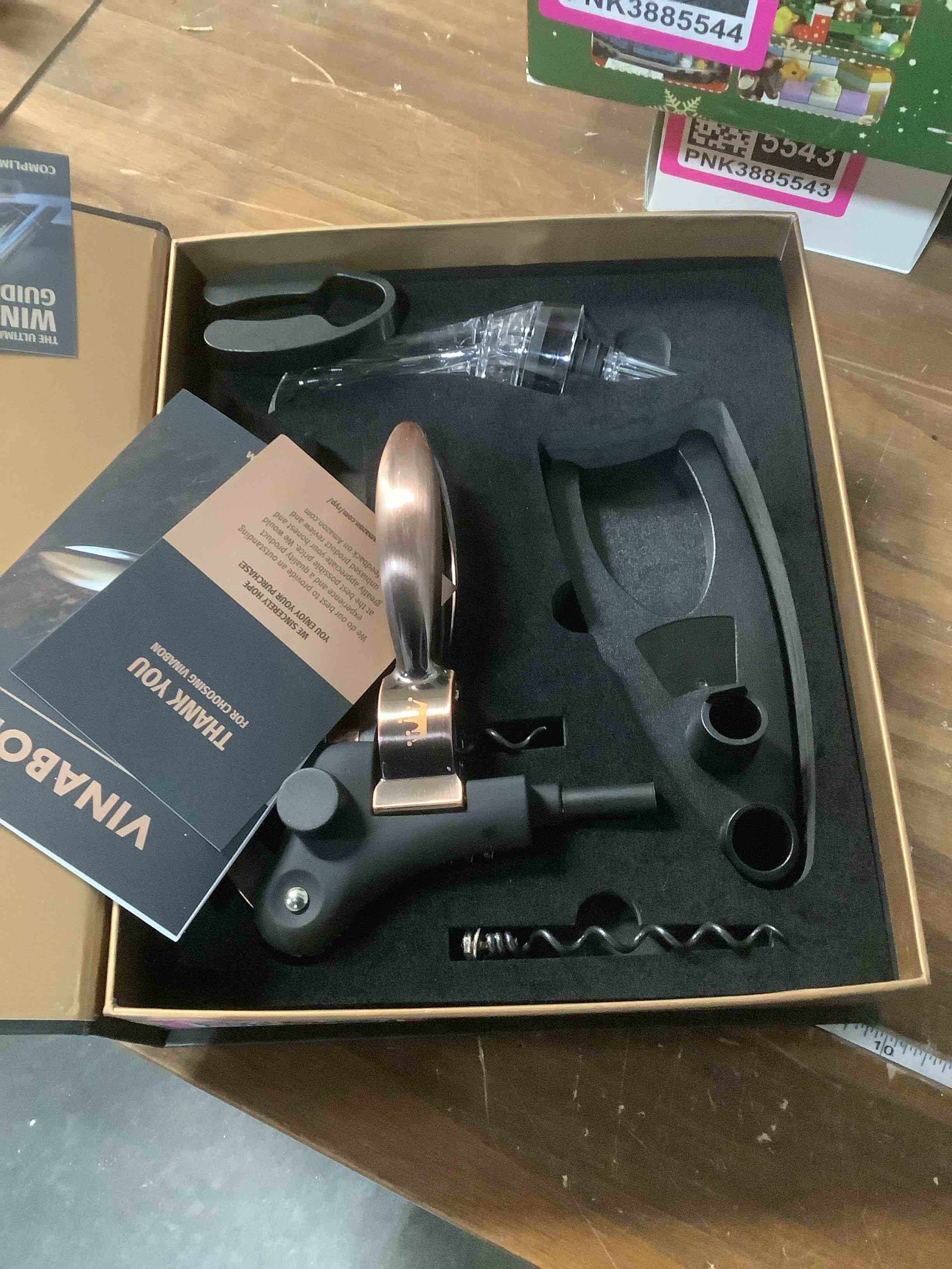 Condition photo showing Good Condition for VINABON Wine Opener Set - Updated 2026 All-in-One Wine Bottle Opener Set with Wine Aerator, Foil Cutter, Stopper, Stand - Manual Lever Corkscrews Wine Opener for Wine Bottles with WineGuide eBook