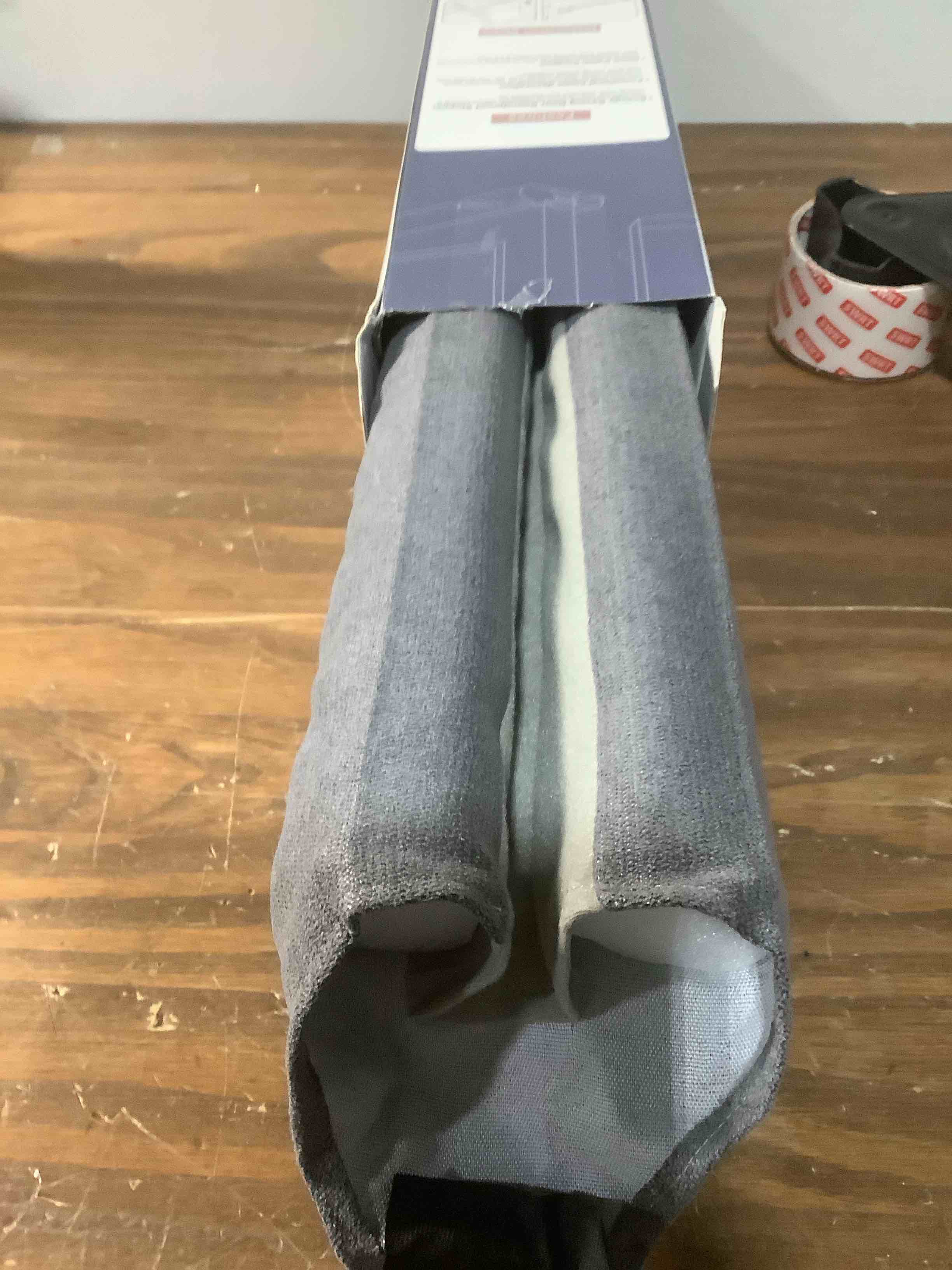 Condition photo showing Good Condition for MAGZO Door Draft Stopper, 32 Inch Adjustable Under Door Gap Filler, Fits 26'' - 32'' Bottom Widths, Seals Gaps up to 1.7", Soundproof Sweep Blocks Air, Noise, Light, Dust- Grey