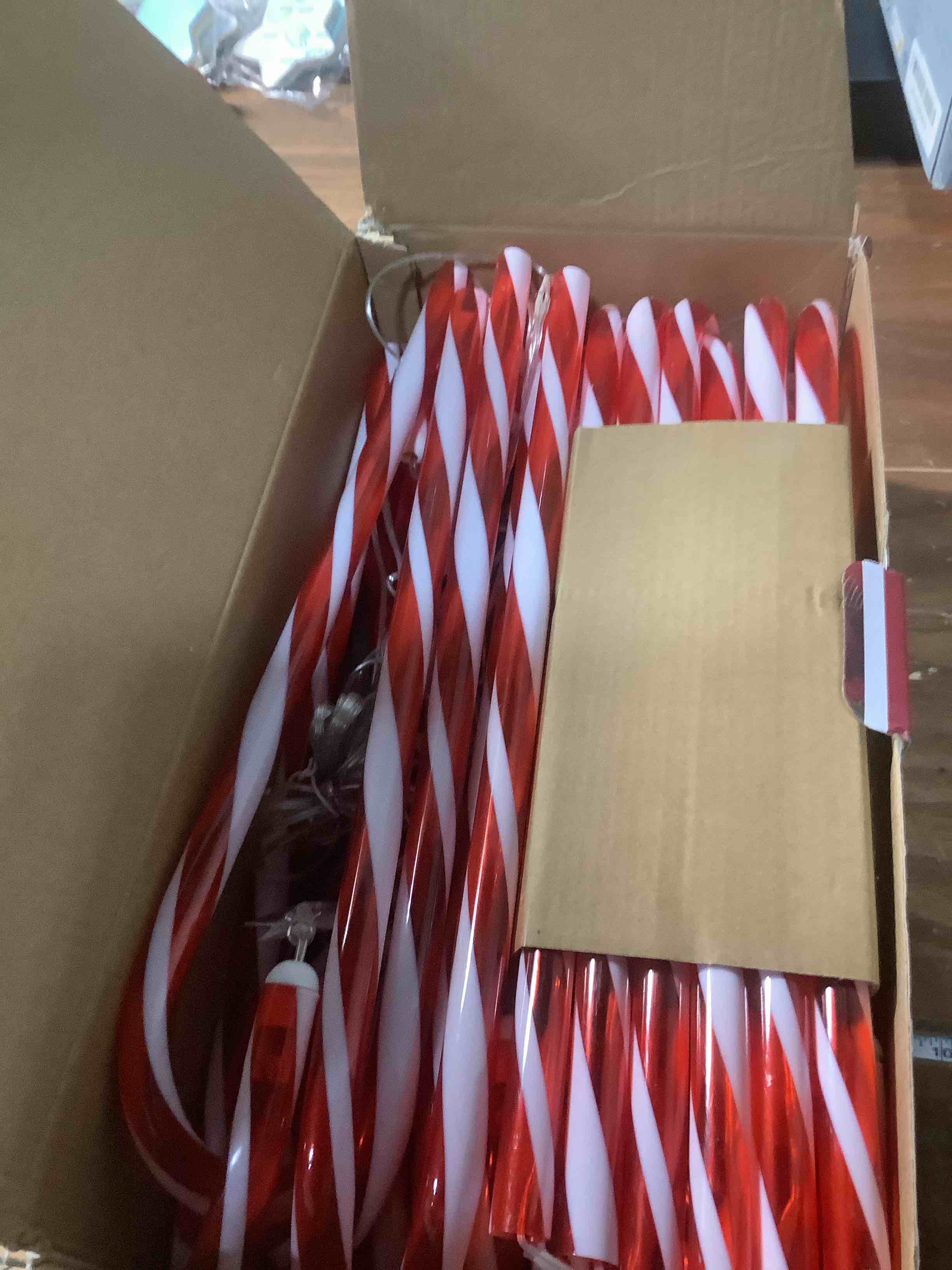 Condition photo showing Good Condition for Solar Christmas Lights Outdoor Decorations: 24-Pack Candy Cane Pathway Lights with 10 Modes - Unique Xmas Gifts for Mom Women - Waterproof Decorative Christmas Yard Stakes for Holiday Garden Decor 24 Pack