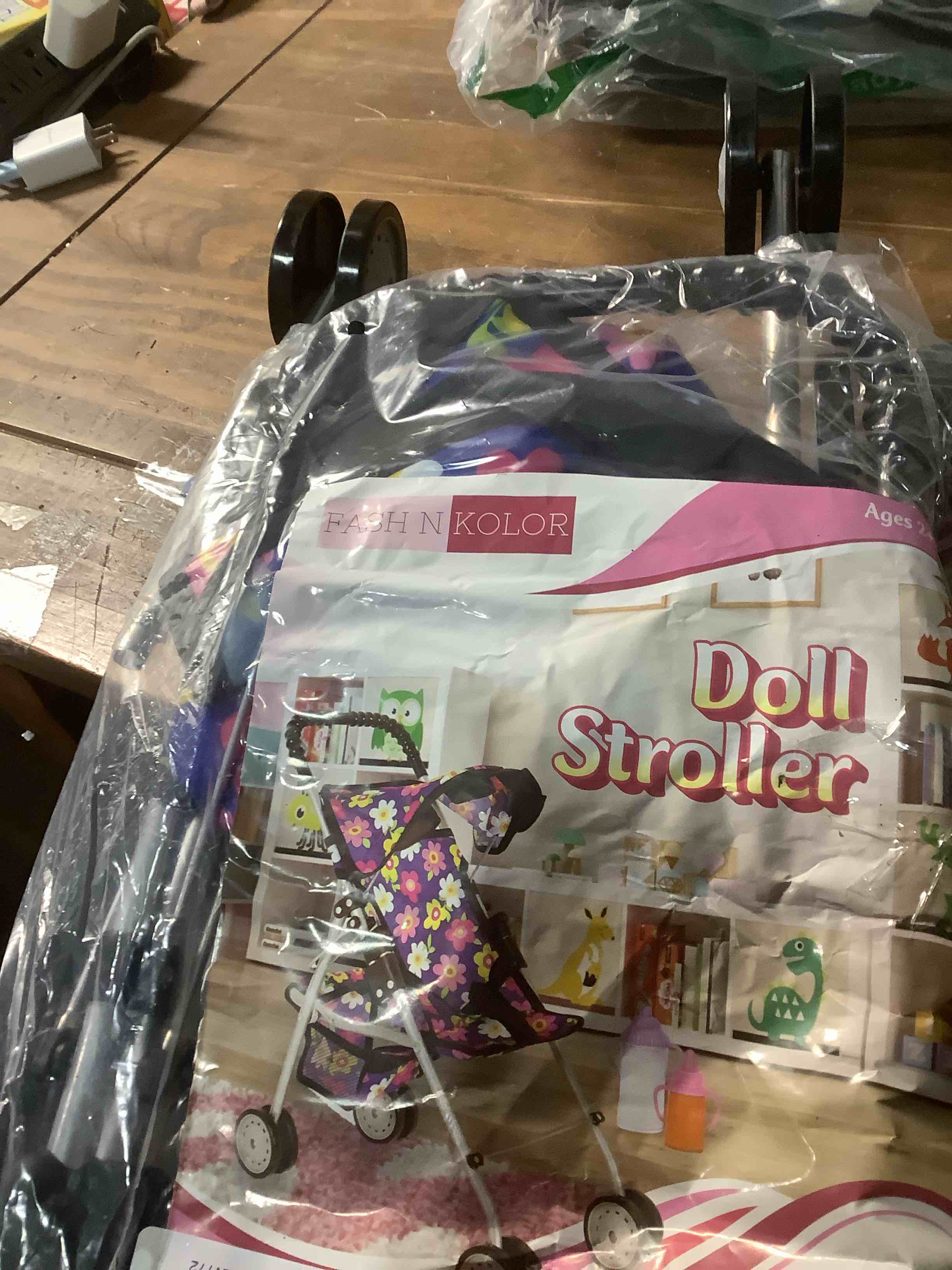 Condition photo showing Good Condition for My First Doll Stroller for Kids – Foldable Baby Toy Doll Stroller with Safety Belt & Storage Basket, Pretend Play Fits up to 18? Dolls, Double Wheels on All 4 Legs – Best Gift for Girls & Boys Flower Design
