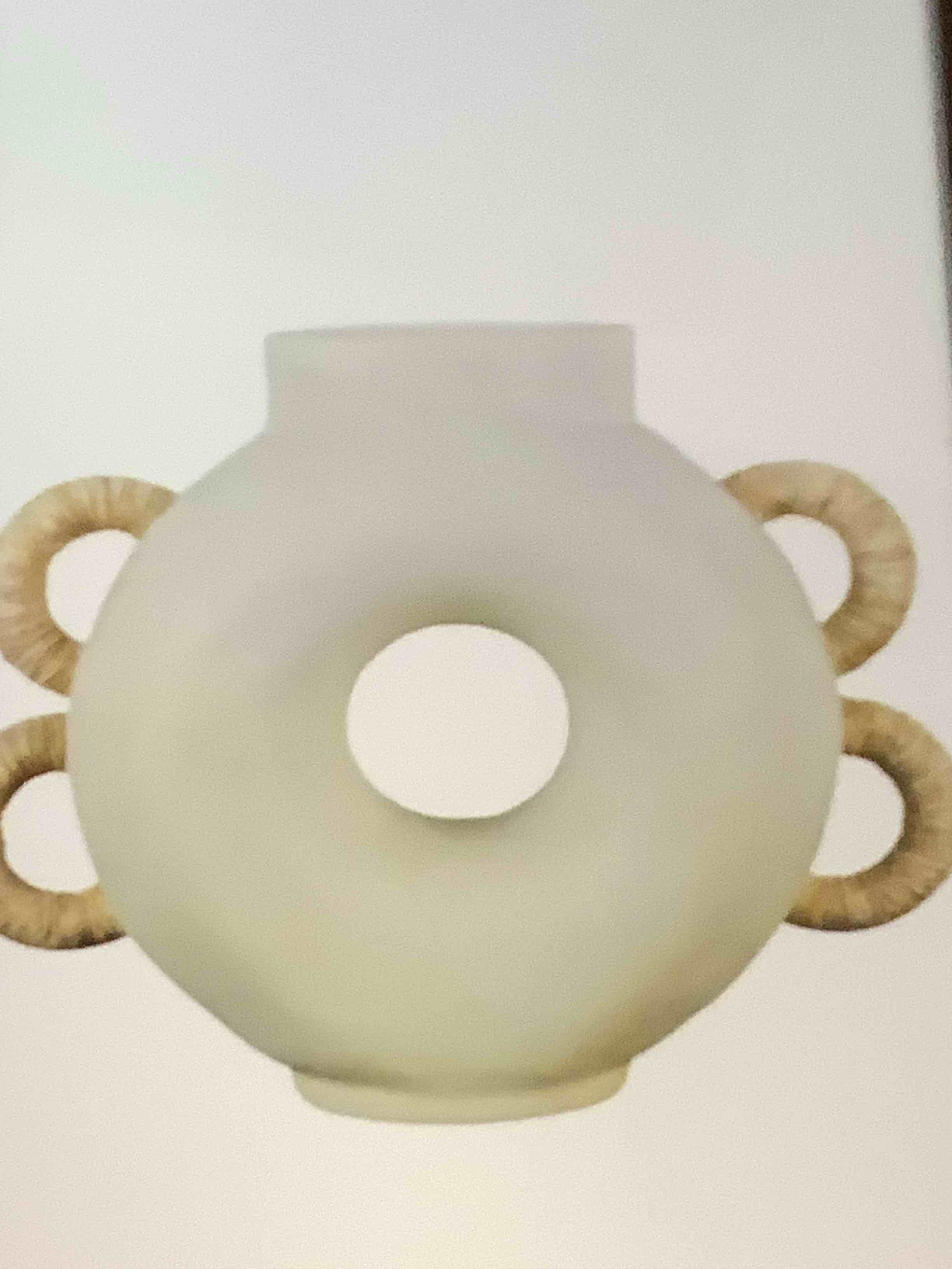 Condition photo showing Good Condition for Deco 79 Resin Decorative Vase Round Speckled Centerpiece Vase with Woven Inspired Arched Handles and Cutout Opening, Flower Vase for Home Decoration 16" x 6" x 13", Cream