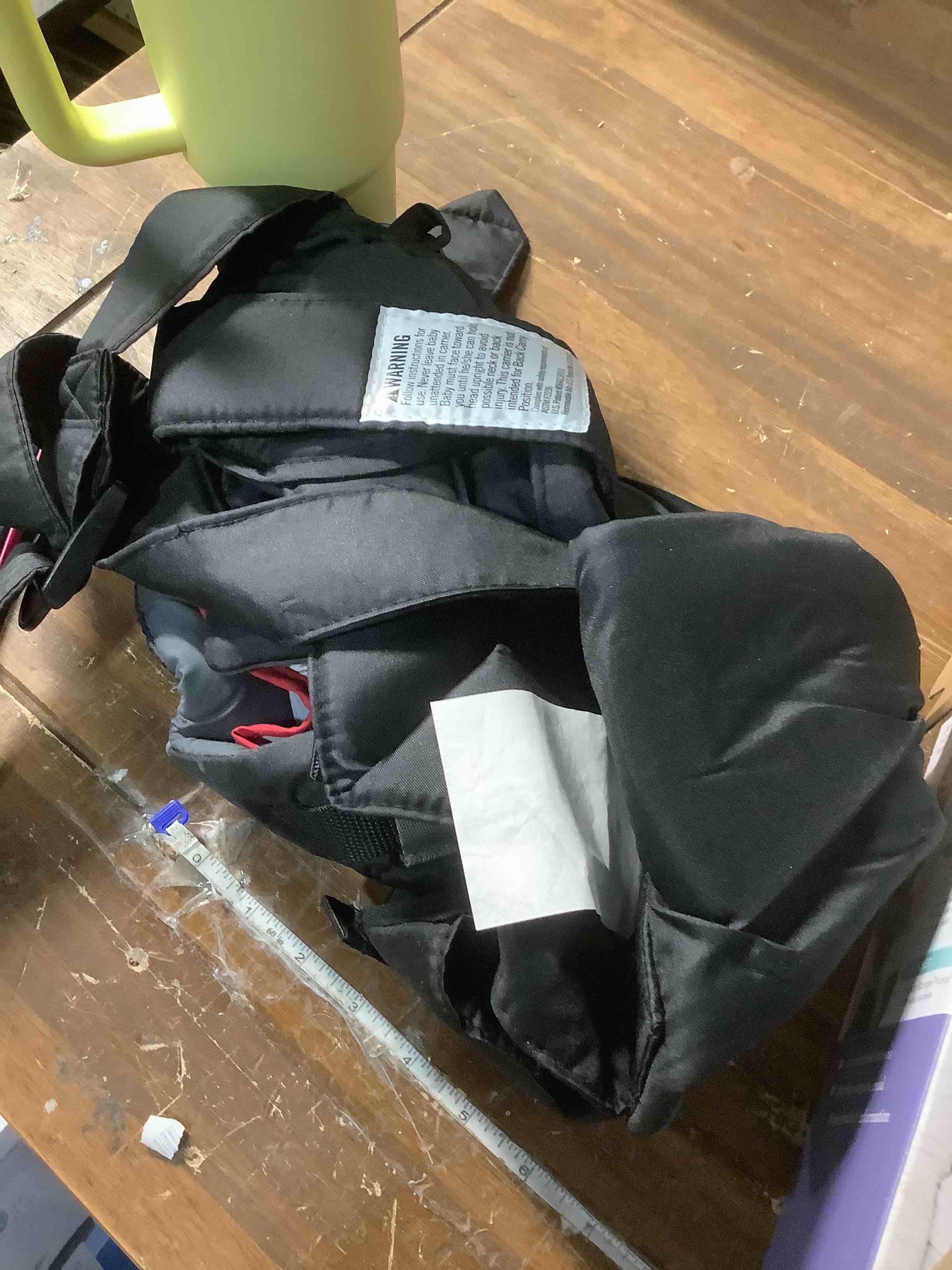 Condition photo showing Good Condition for Infantino Swift Classic Carrier with Pocket, 2-Ways to Carry Carrier with Wonder Bib & Essentials Storage Front Pocket for Babies 8-25lb, Adjustable Strap, Black