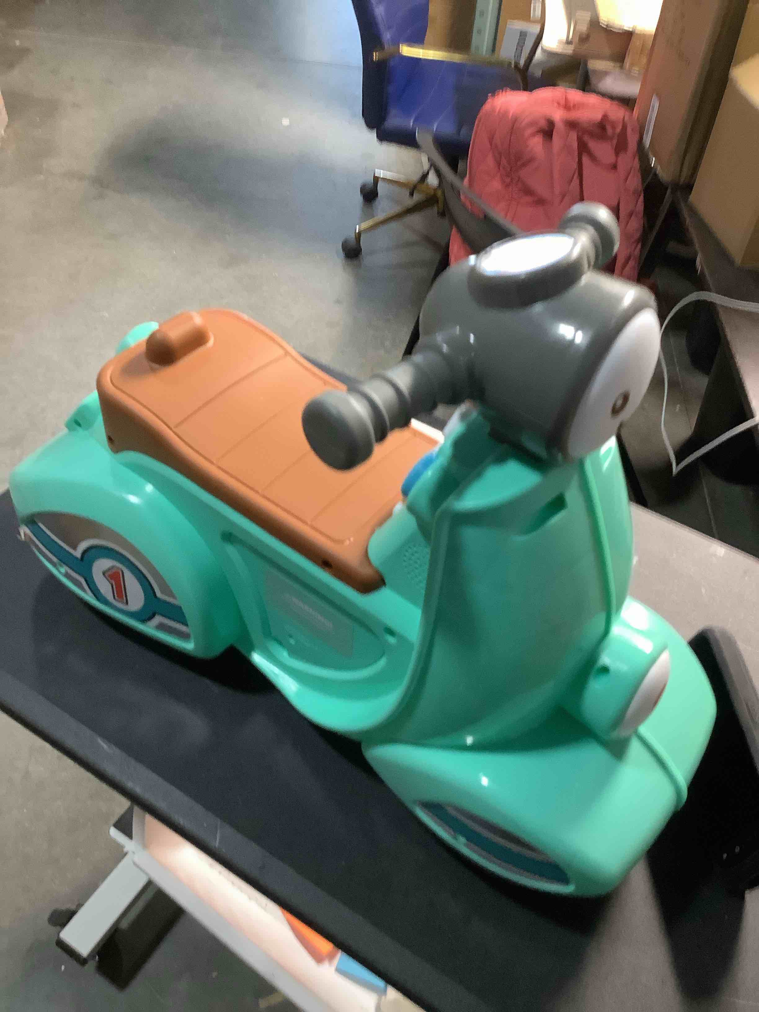 Condition photo showing Good Condition for Chicco Vespa Primavera for Children, Green, Mobile Toy Motorcycle with Electronic Control Panel, Lights and Sounds, Removable Stabilisers, Max 25 kg, Toy for Children 1-3 Years