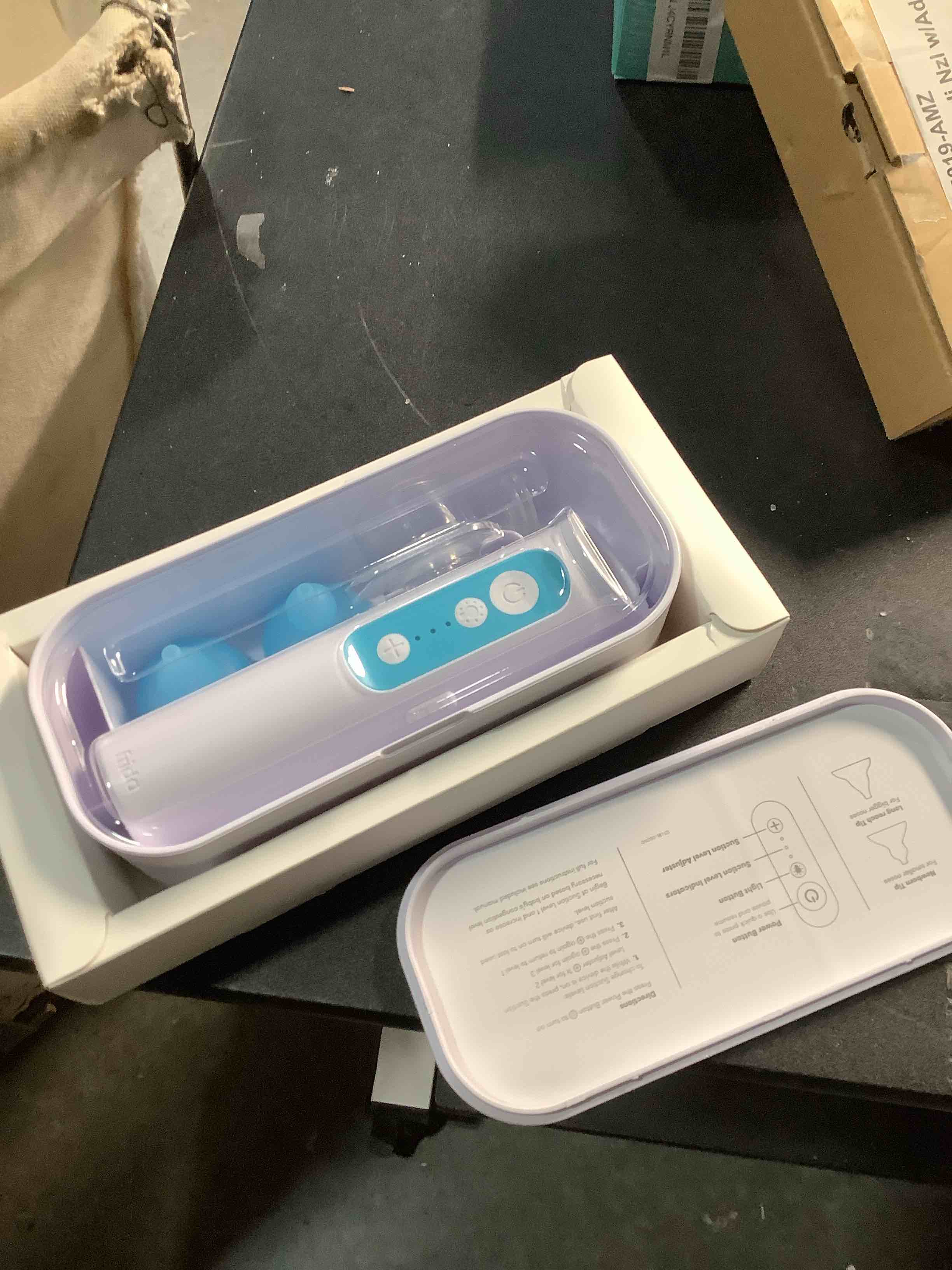 Condition photo showing Good Condition for Frida Baby Electric NoseFrida Nasal Aspirator for Baby, Nose Sucker for Baby & Toddler, Upgraded Nasal Aspirator for Congestion + Allergy Relief with 3 Suction Levels, 2 Silicone Tips, USB