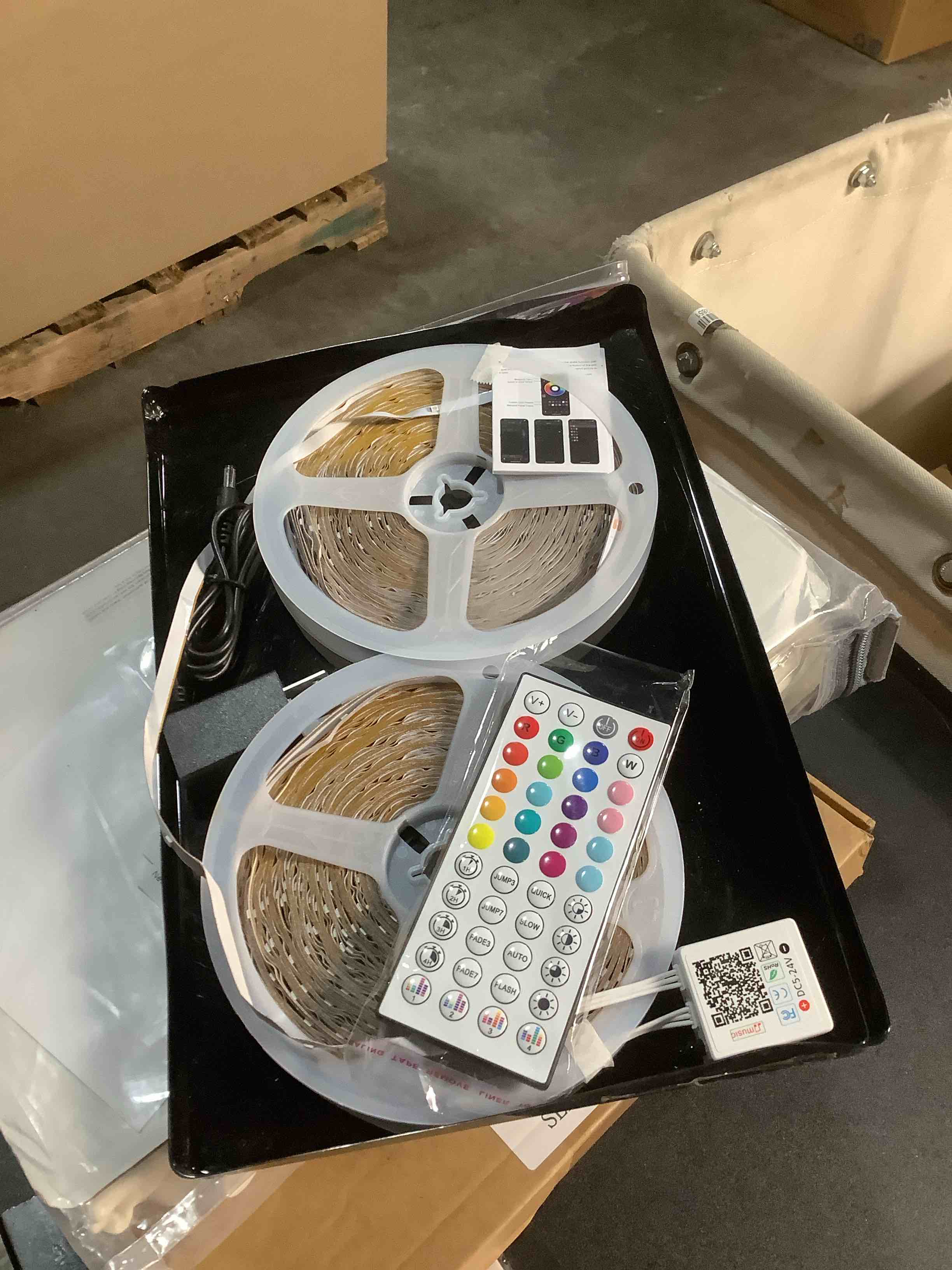 Condition photo showing As Is for 200 FT Led Lights for Bedroom, Music Synchronized Smart Led Strip Lights, Ultra Long with Remote Application Control Bluetooth LED Lights, Color Change RGB Light 200FT