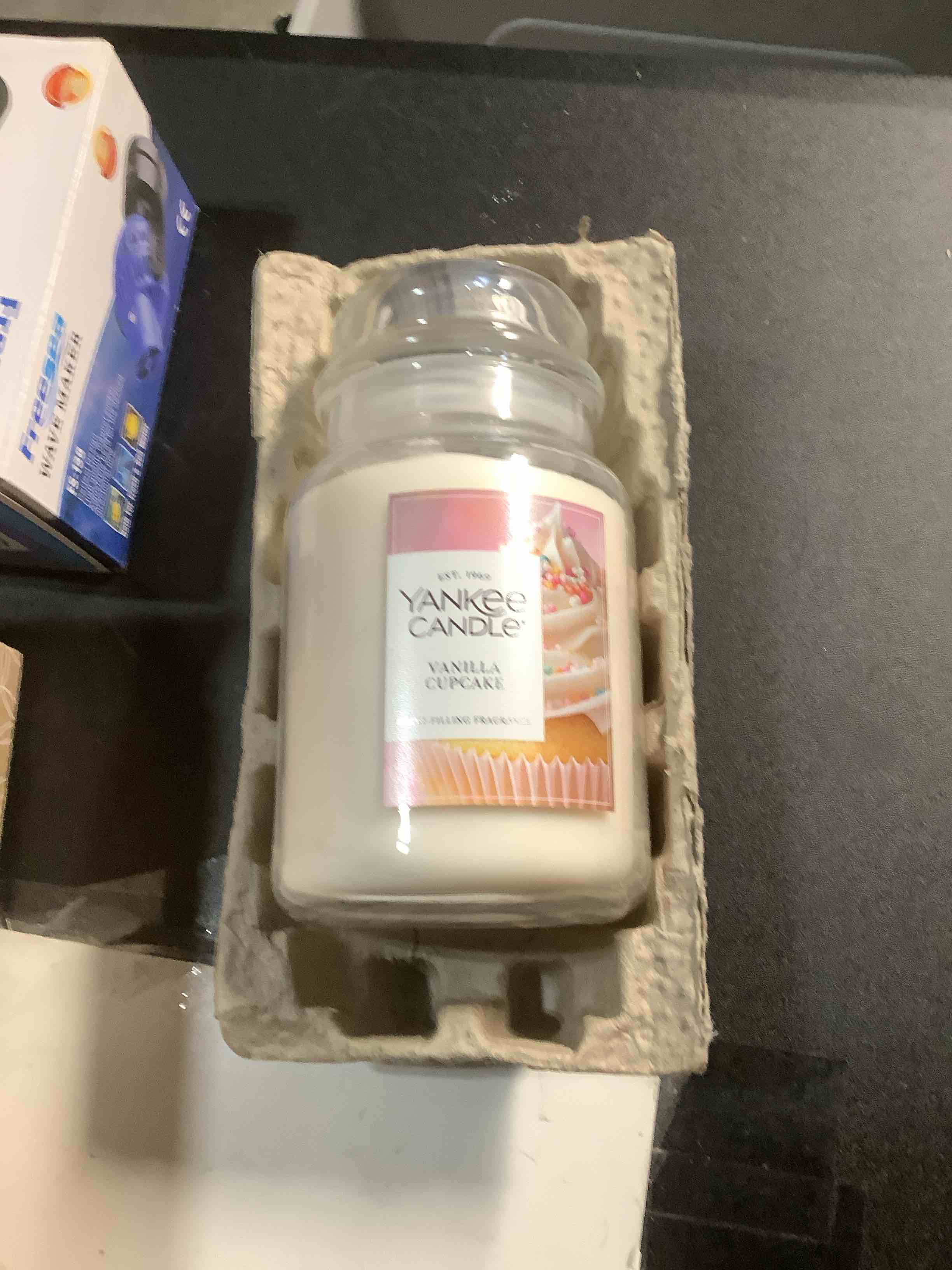 Condition photo showing Good Condition for Yankee Candle Vanilla Cupcake, Scented Candle, 22oz Large Jar with up to 150 Hour Burn Time, Giftable, Birthdays White