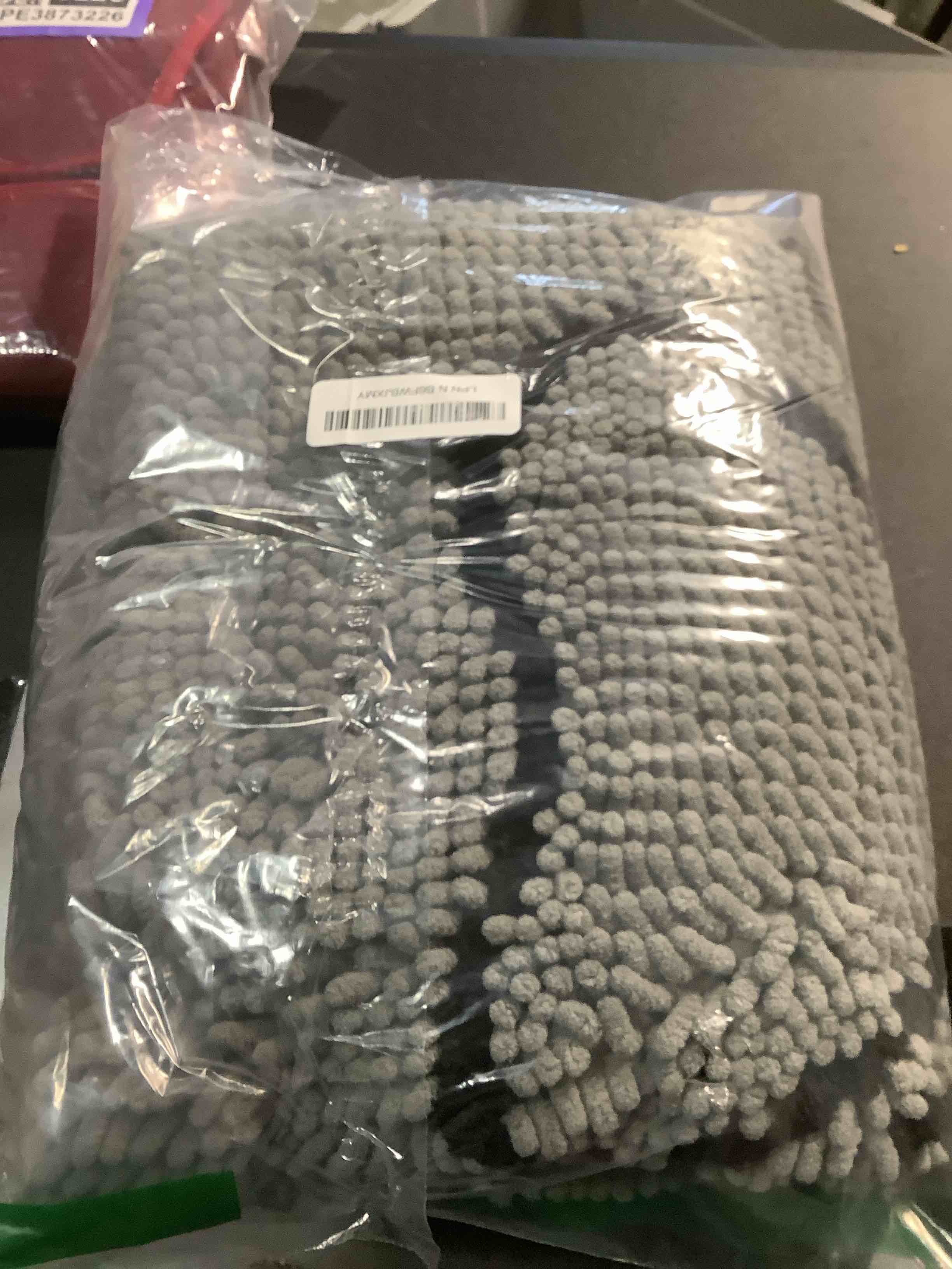 Condition photo showing Good Condition for OLANLY Dog Door Mat for Muddy Paws 32x20, Paw Print Design, Absorbs Moisture and Dirt, Absorbent Non-Slip Washable Doormat, Quick Dry Chenille Mud Mat for Dogs, Entry Indoor Entryway Carpet, Grey Grey Paw Print 32" x 20"