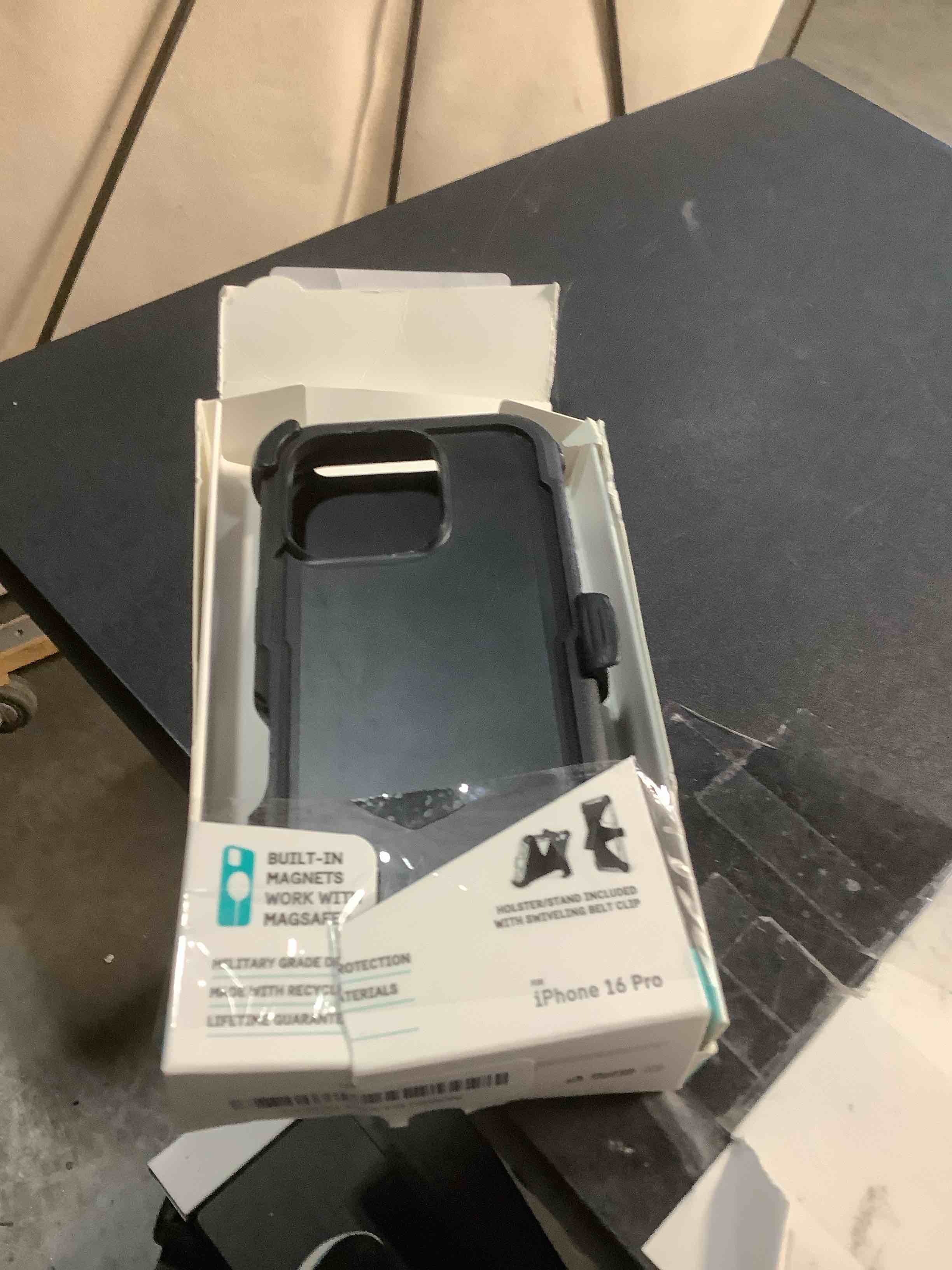 Condition photo showing Good Condition for Pelican Voyager iPhone 16 Pro Case [Compatible with MagSafe] Rugged Phone Case w/ 18ft Military-Grade Drop Protection - Heavy Duty Phone Cover w/Belt Clip Holster for iPhone 16 Pro - Black Voyager Black iPhone 16 Pro