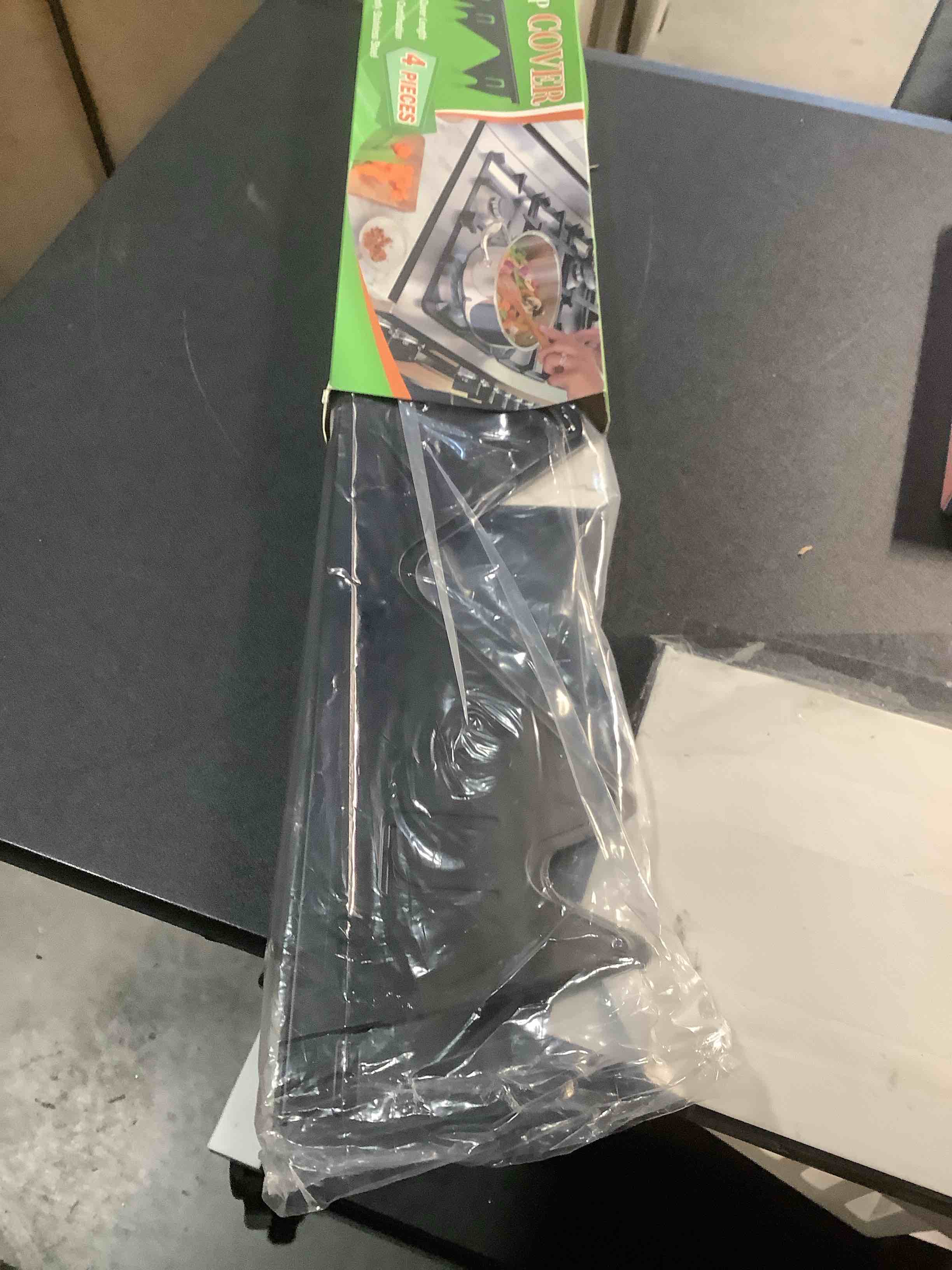 Condition photo showing Good Condition for Stove Gap Covers Stainless Steel, 2 Pack Stove Gap Filler Easy Retractable Length 13.8" to 27.5", Width 0.79" ALMCALS Stove Gap Guards Range Trim Kit, Heat Resistant Guard Between Stove Top & Counter Black