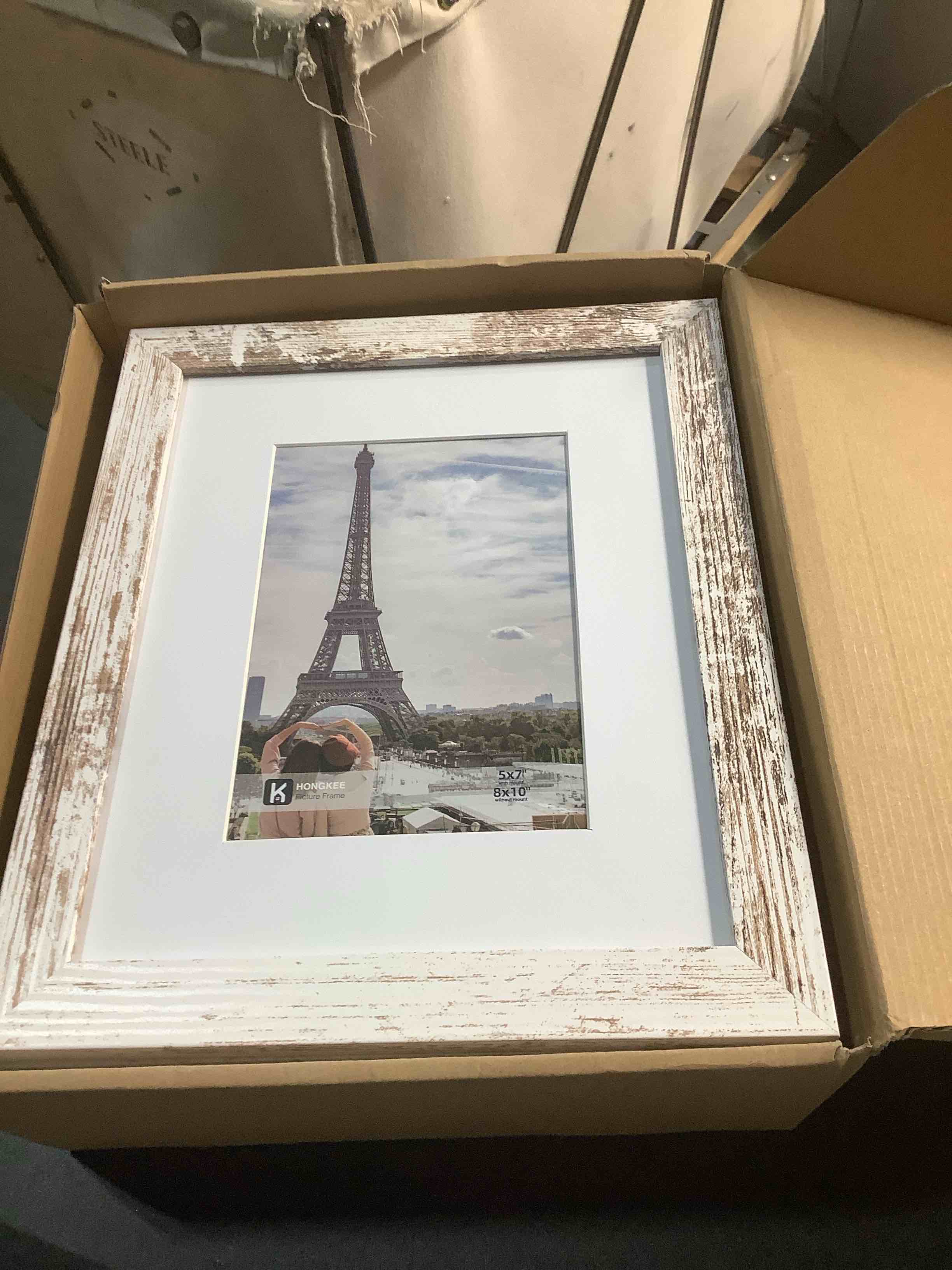 Condition photo showing Good Condition for 8x10 Picture Frame Set of 4, Made of Real Glass and Distressed White Wooden Frame, 8 by 10 Photo for Wall or Tabletop - Display Picture 5x7 with Mat or 8x10 Without Mat Distressed White 8x10 in